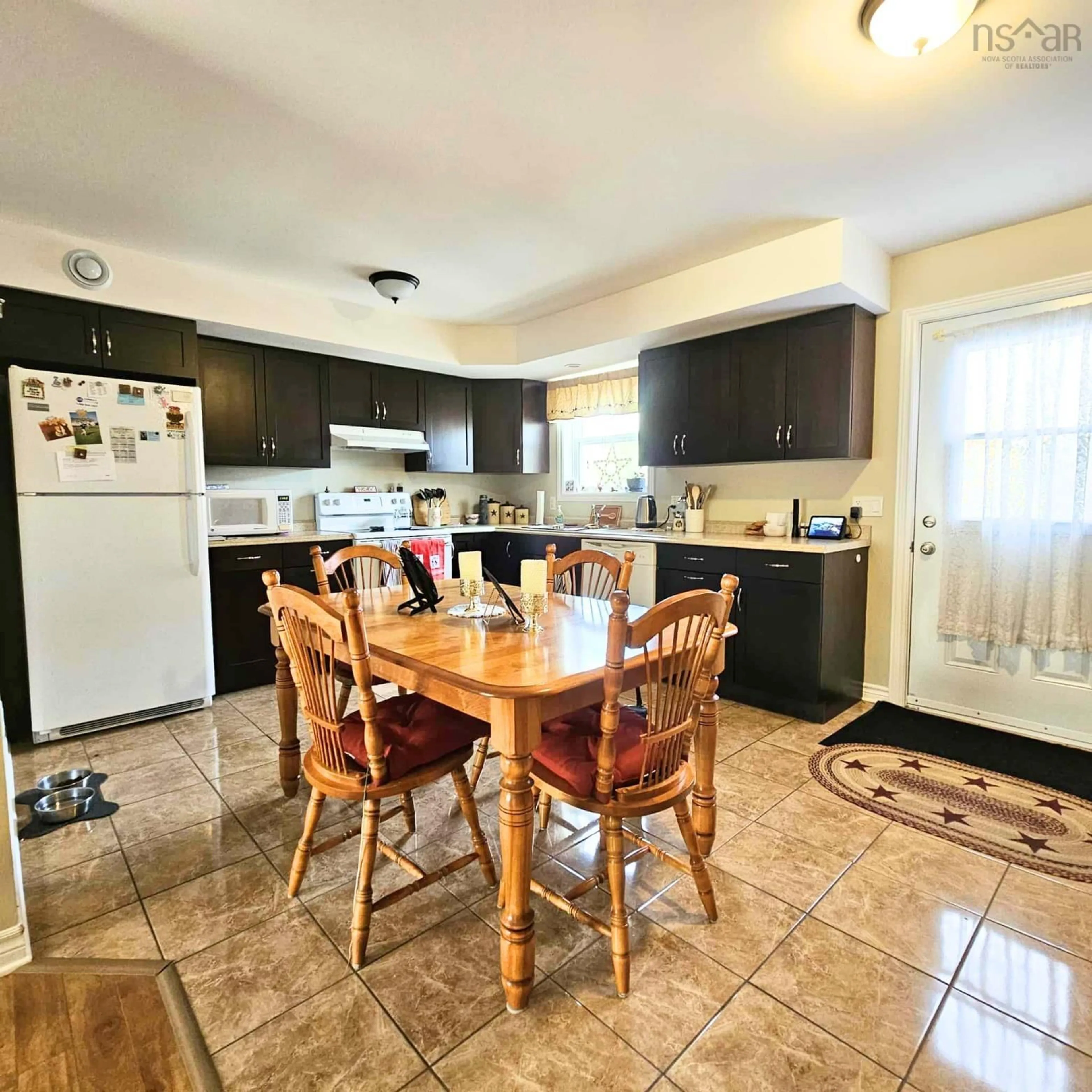 Open concept kitchen, ceramic/tile floor for 135-137 Brook St, North Sydney Nova Scotia B2A 3R4