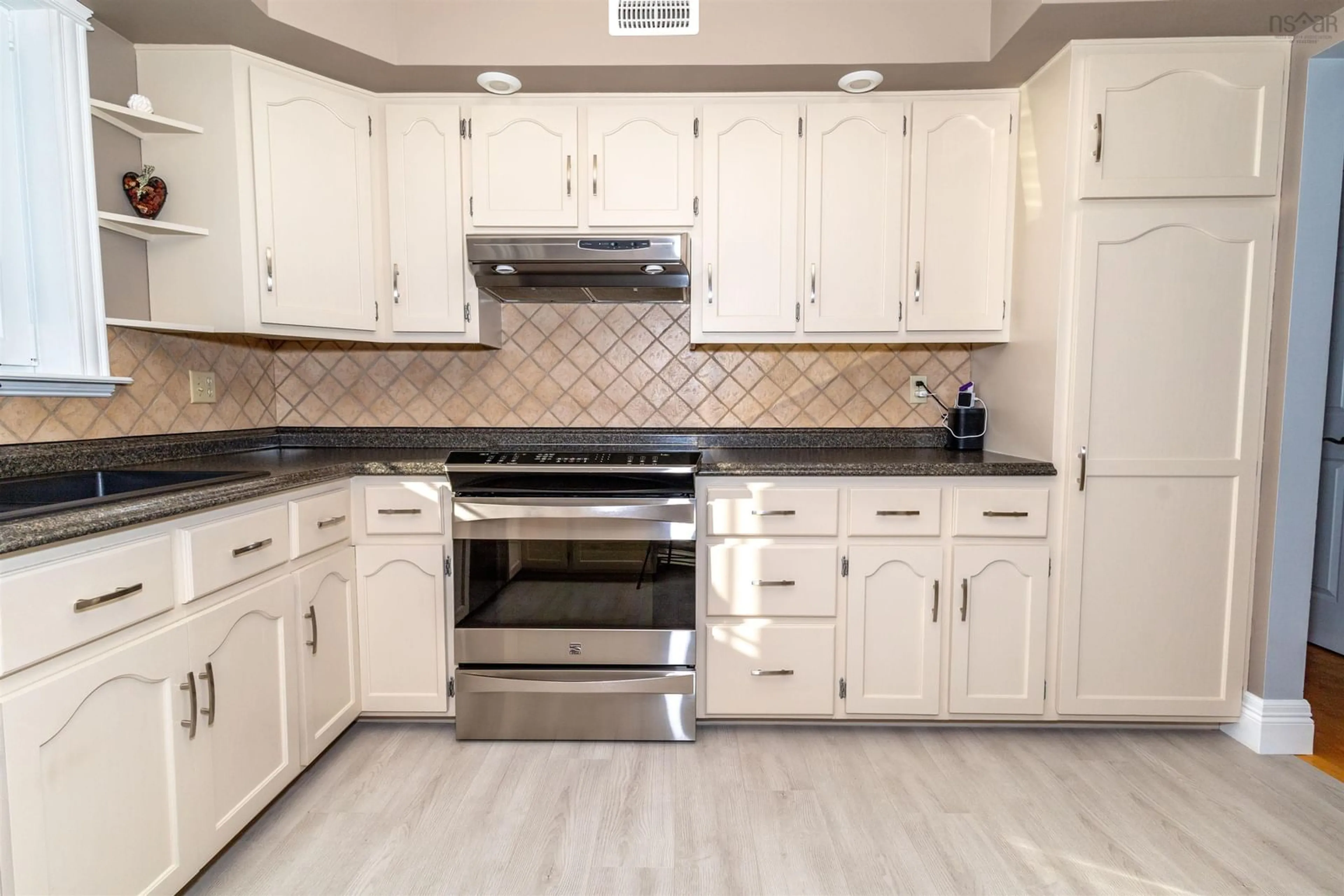 Open concept kitchen, ceramic/tile floor for 8472 West Bay Rd, Sampsonville Nova Scotia B0E 3B0