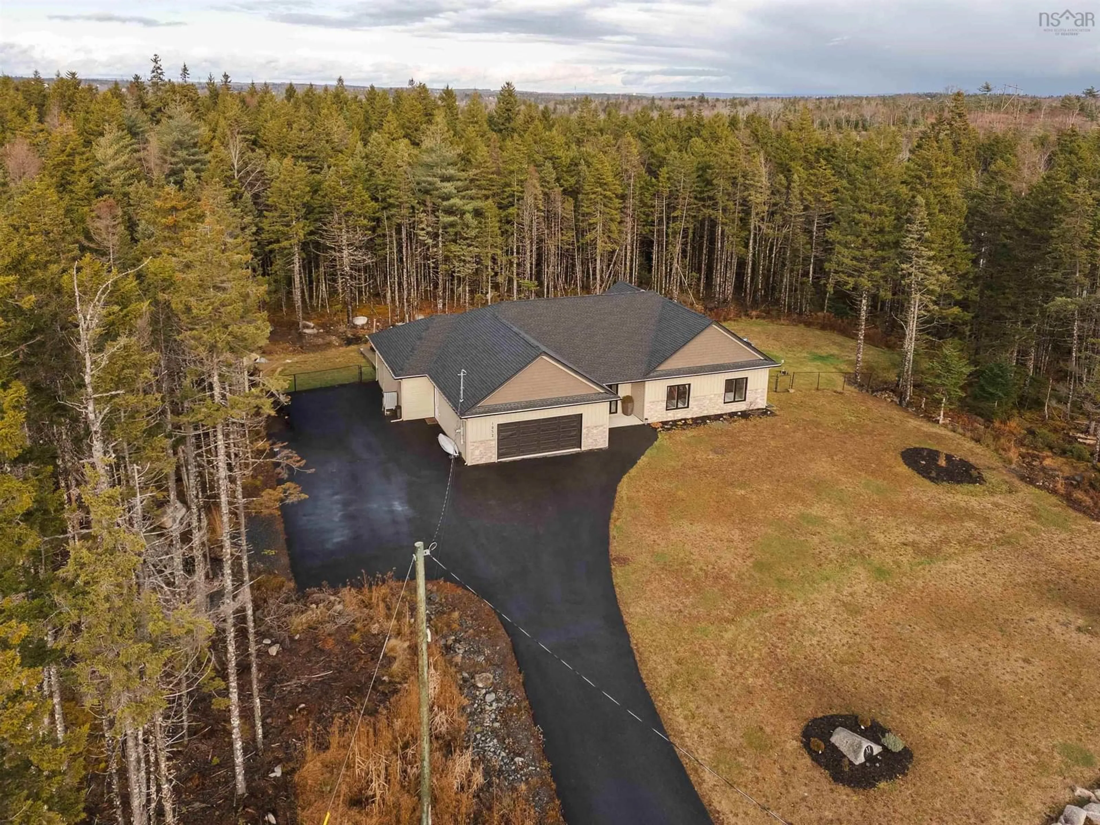 A pic from outside/outdoor area/front of a property/back of a property/a pic from drone, unknown for 1052 Voyageur Way, Hammonds Plains Nova Scotia B4B 0N6