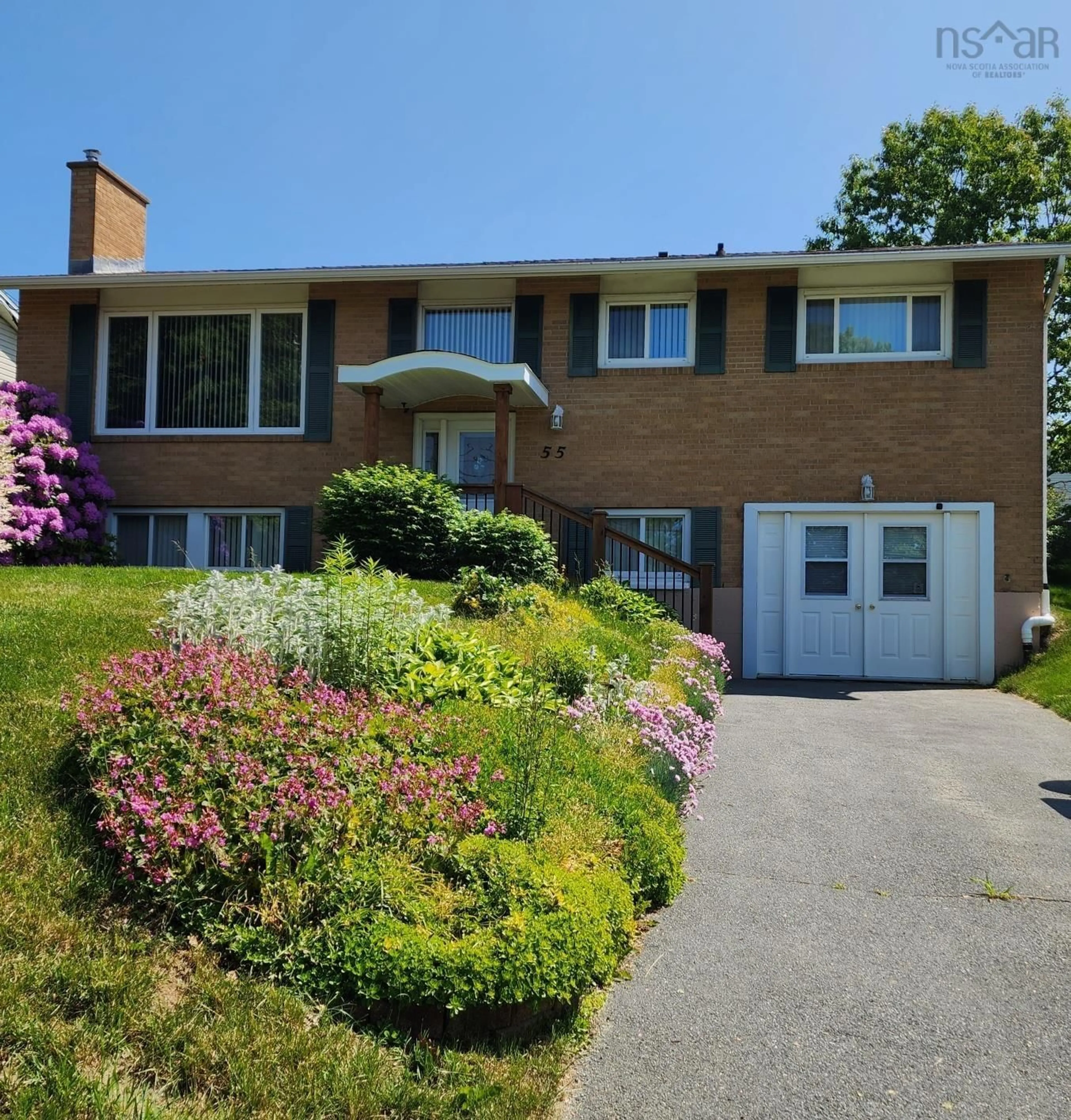 Home with brick exterior material, street for 55 Oakmount Dr, Bedford Nova Scotia B4A 2W1