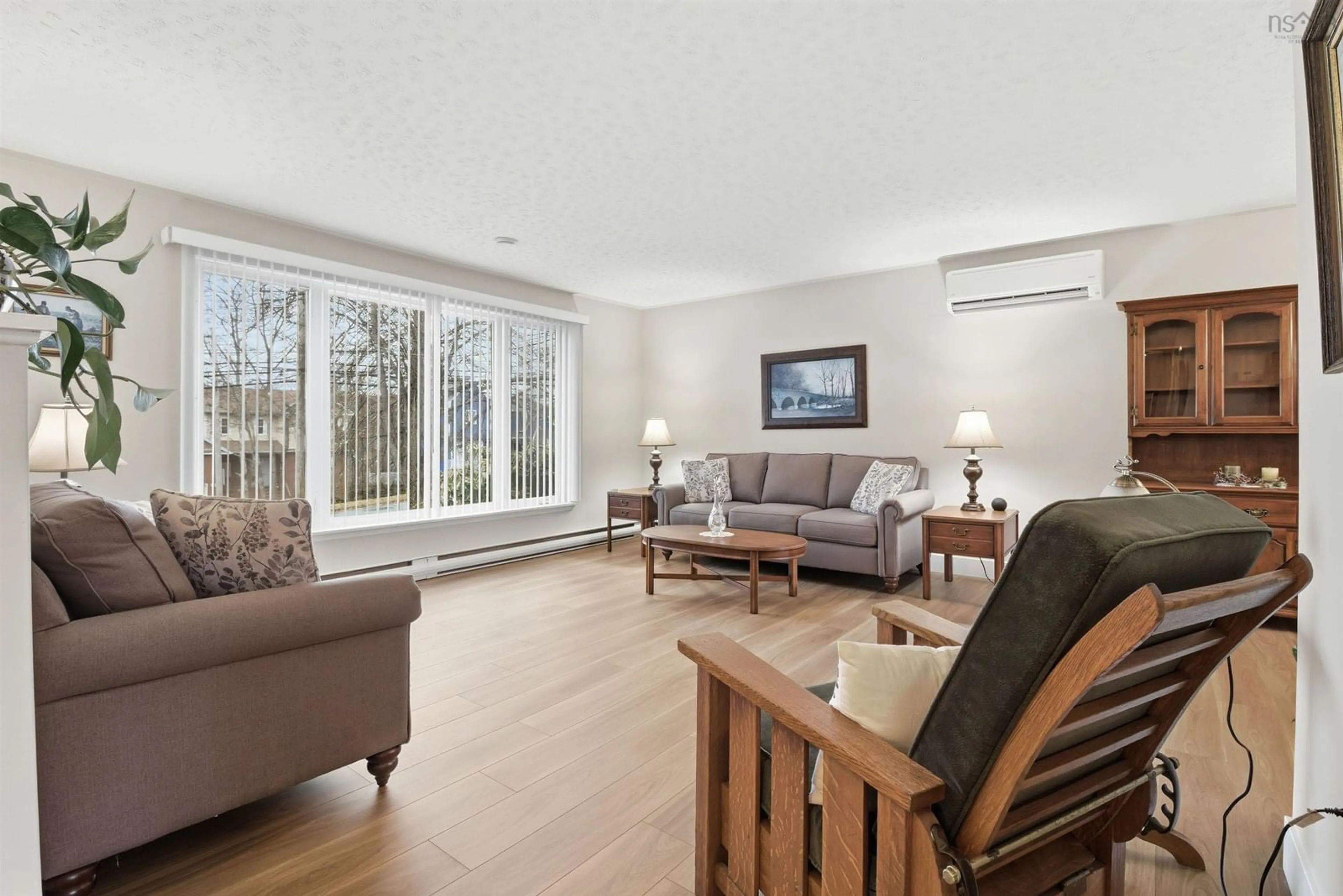 Living room with furniture, wood/laminate floor for 55 Oakmount Dr, Bedford Nova Scotia B4A 2W1