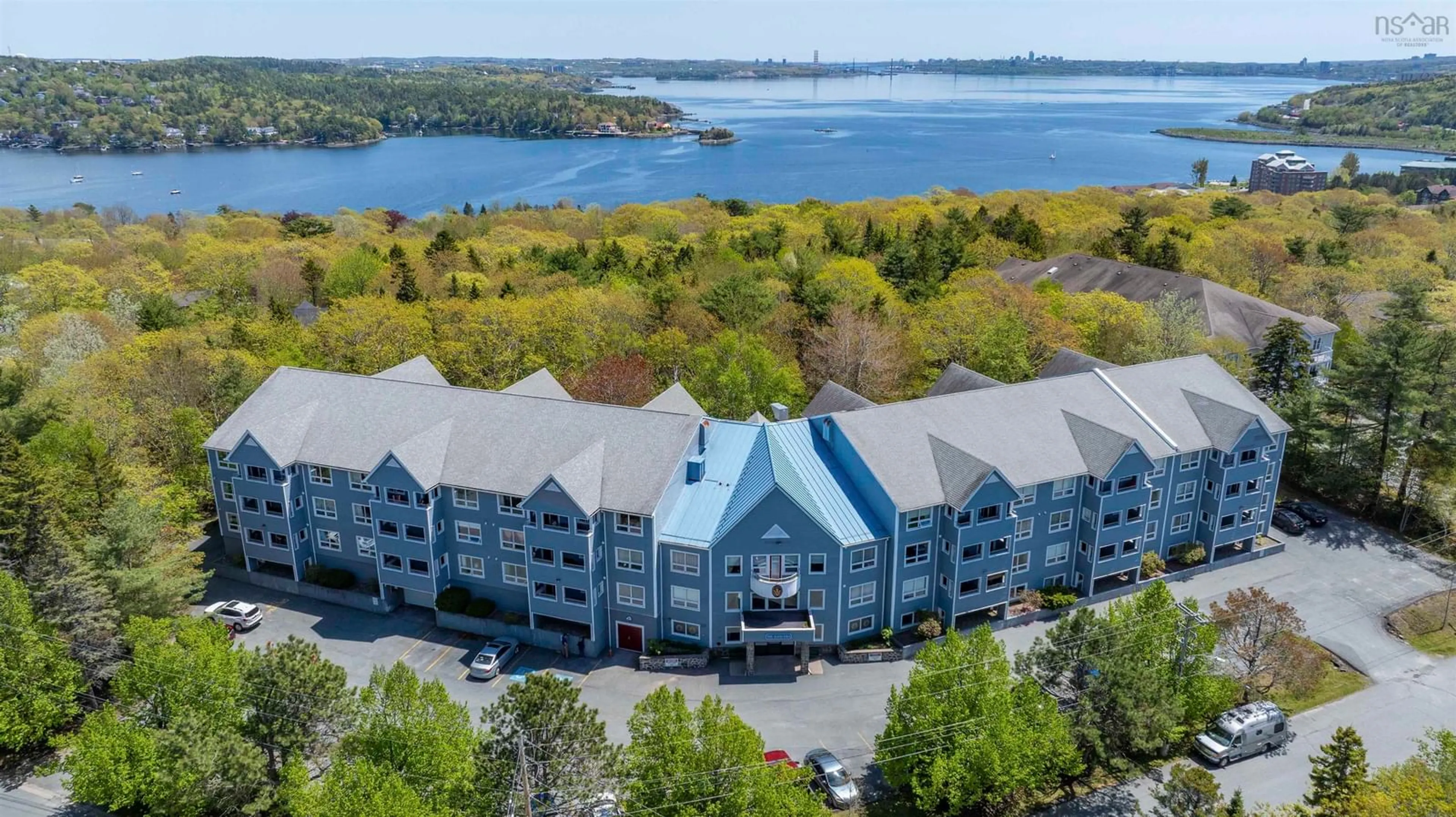 A pic from outside/outdoor area/front of a property/back of a property/a pic from drone, water/lake/river/ocean view for 51 Wimbledon Rd #113, Bedford Nova Scotia B4A 3M7