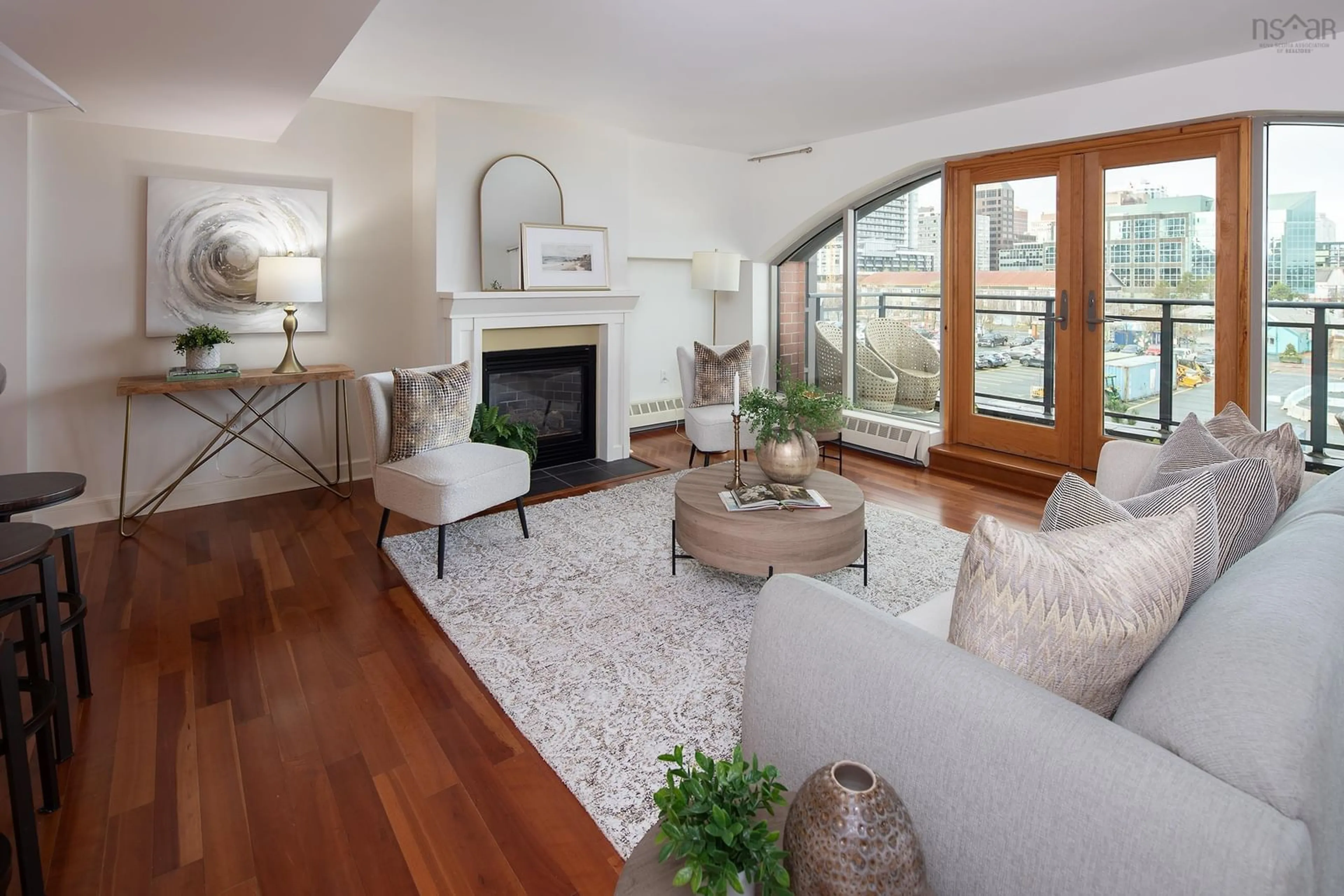 Living room with furniture, wood/laminate floor for 1477 Lower Water St #411, Halifax Nova Scotia B3J 3Z4