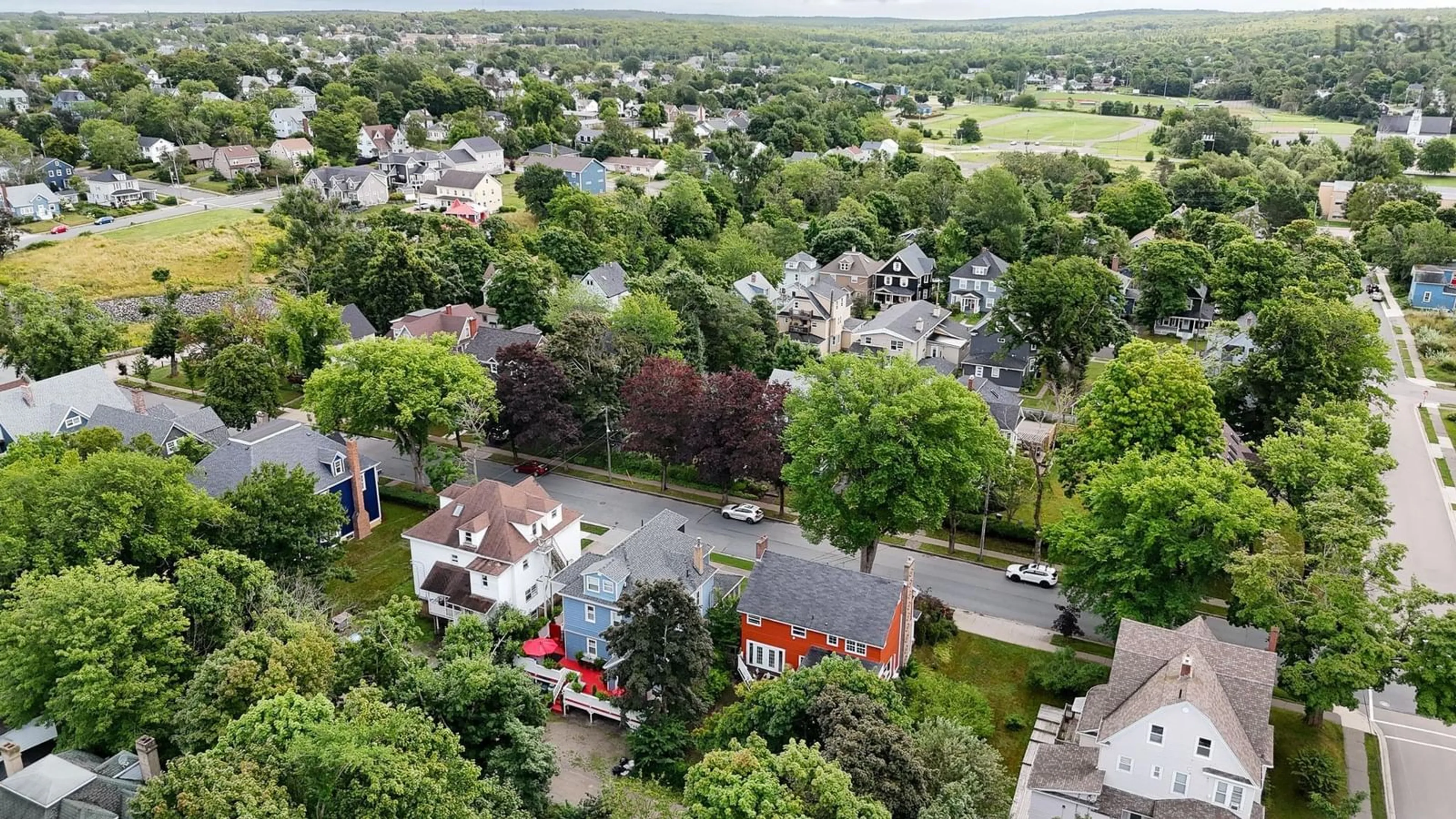 A pic from outside/outdoor area/front of a property/back of a property/a pic from drone, street for 79 Whitney Ave, Sydney Nova Scotia B1P 4Z8