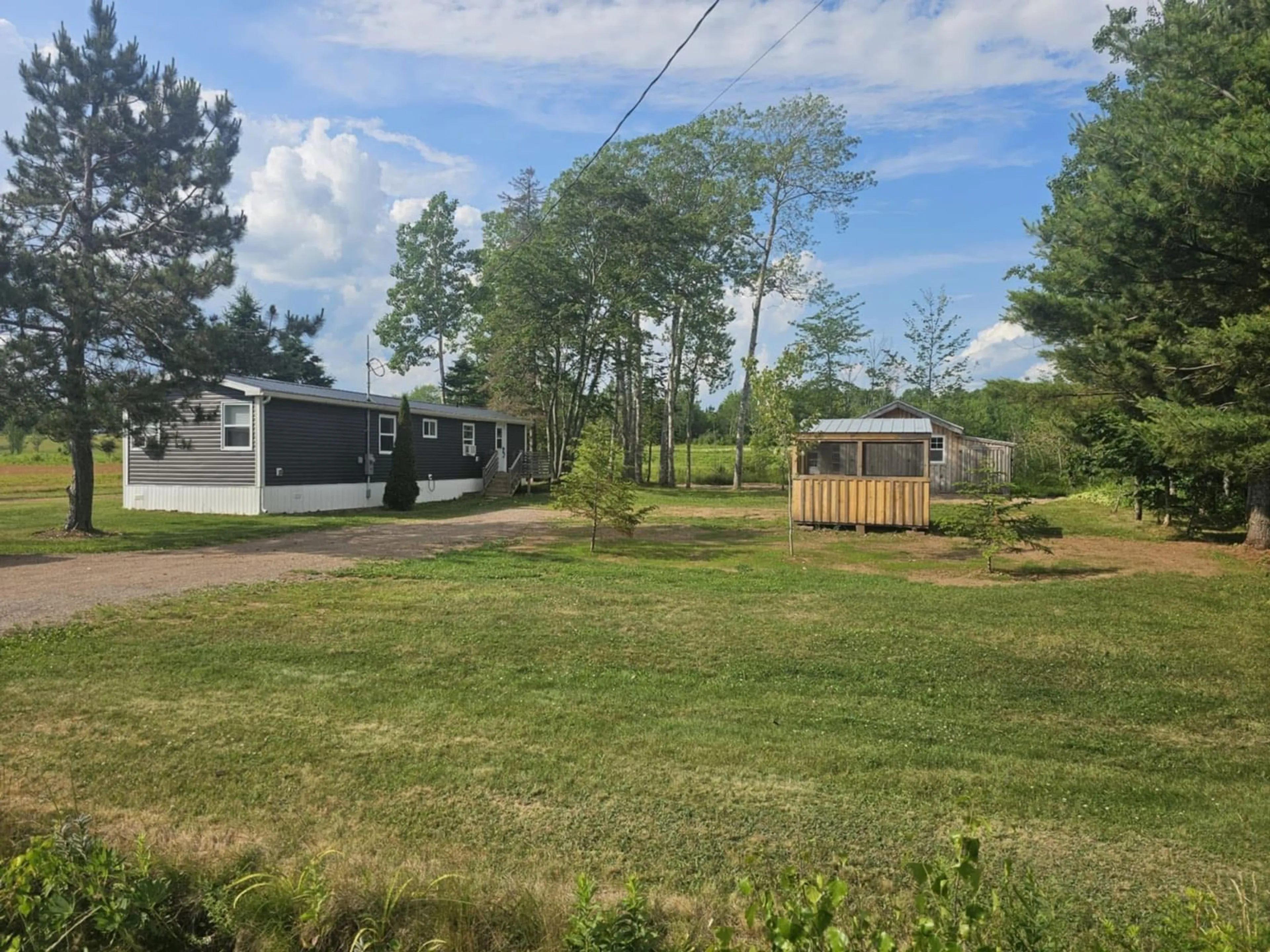 A pic from outside/outdoor area/front of a property/back of a property/a pic from drone, unknown for 7051 Highway 2, Portapique Nova Scotia B0M 1B0