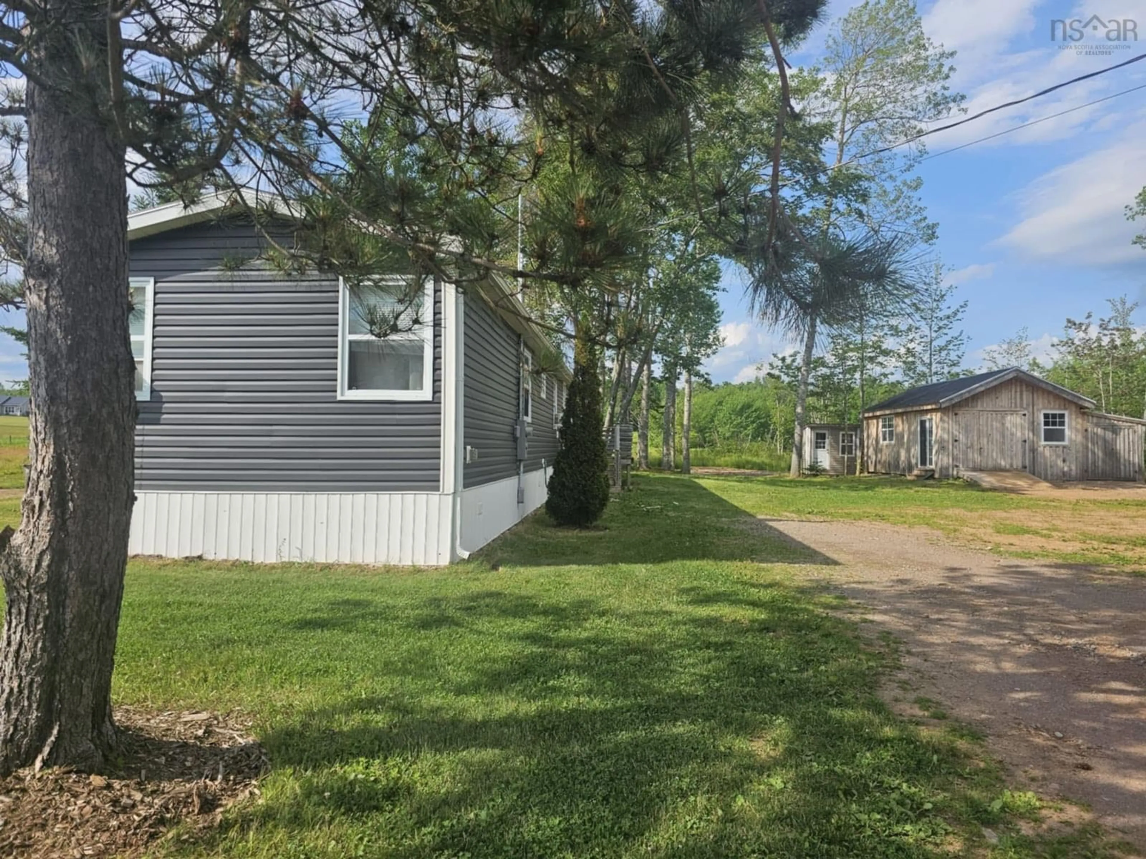 A pic from outside/outdoor area/front of a property/back of a property/a pic from drone, street for 7051 Highway 2, Portapique Nova Scotia B0M 1B0