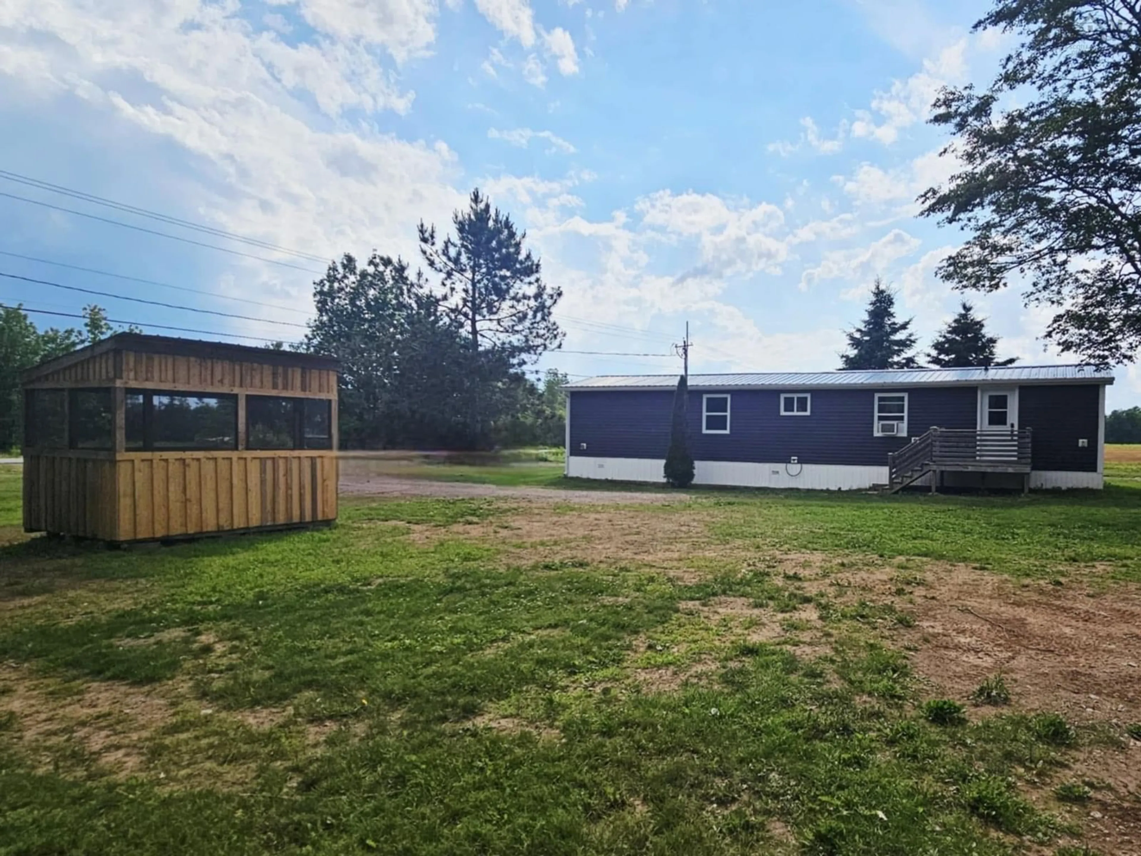 A pic from outside/outdoor area/front of a property/back of a property/a pic from drone, unknown for 7051 Highway 2, Portapique Nova Scotia B0M 1B0