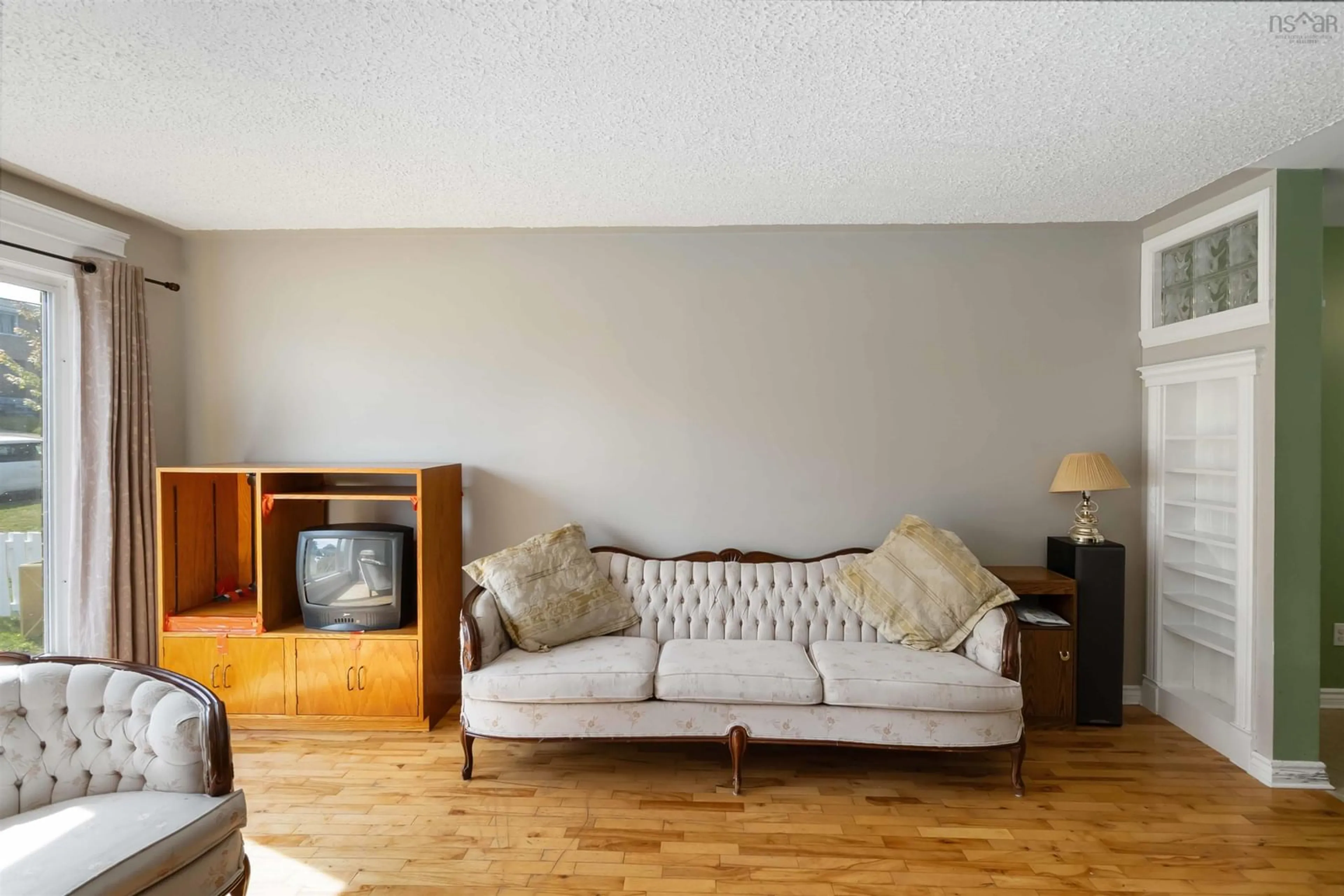 Living room with furniture, wood/laminate floor for 123B Adelaide Ave, Halifax Nova Scotia B3N 2P1
