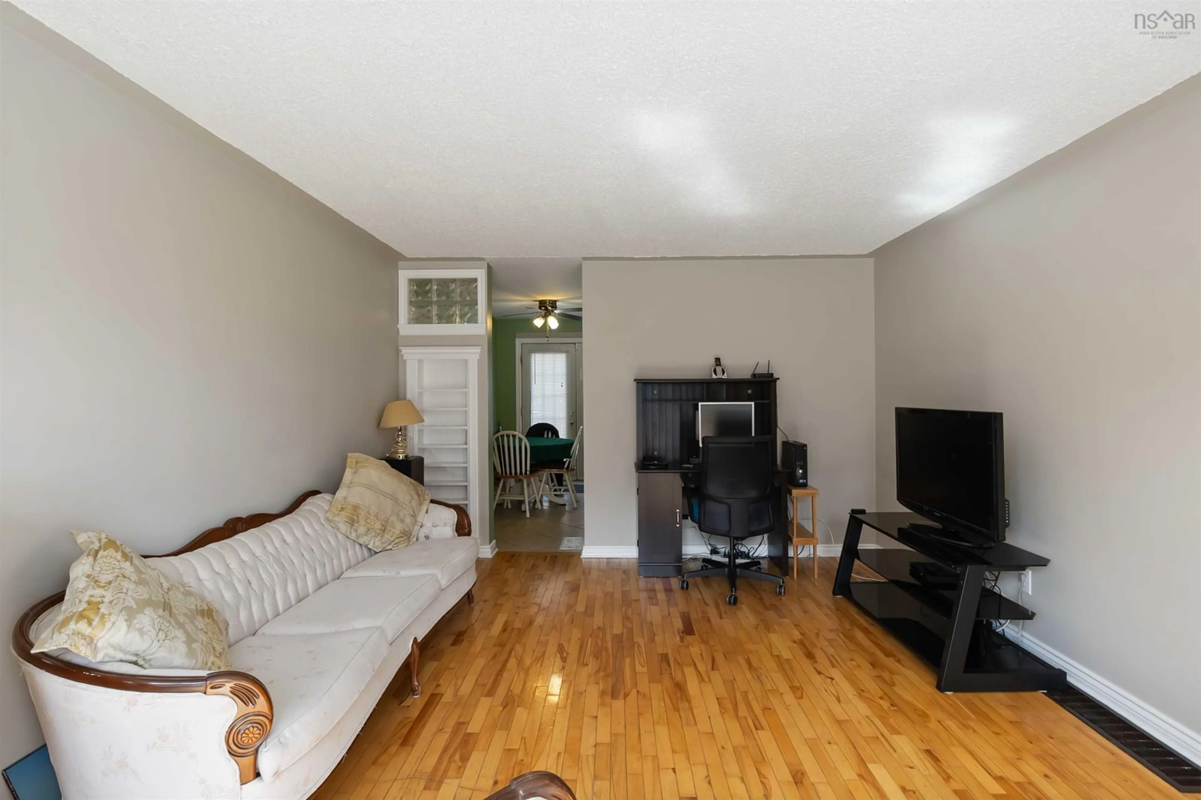 Living room with furniture, wood/laminate floor for 123B Adelaide Ave, Halifax Nova Scotia B3N 2P1