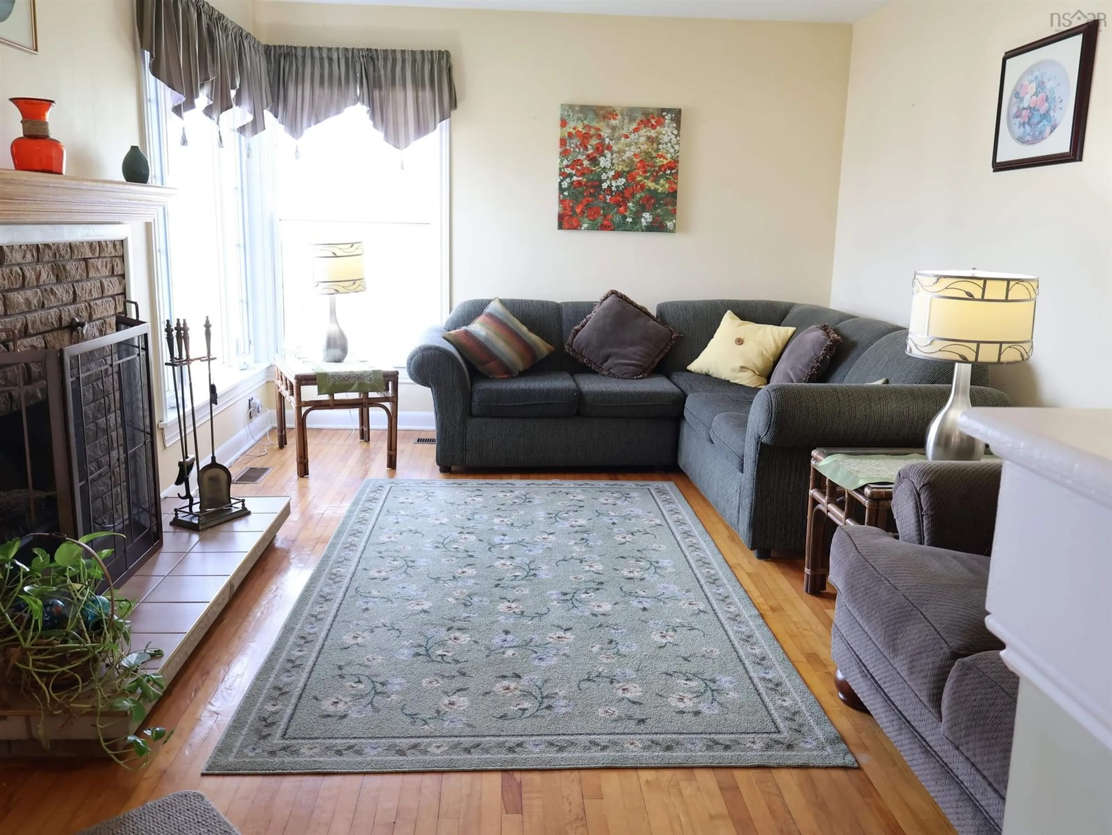 Living room with furniture, unknown for 30 Harold St, Sydney Nova Scotia B1P 3L9
