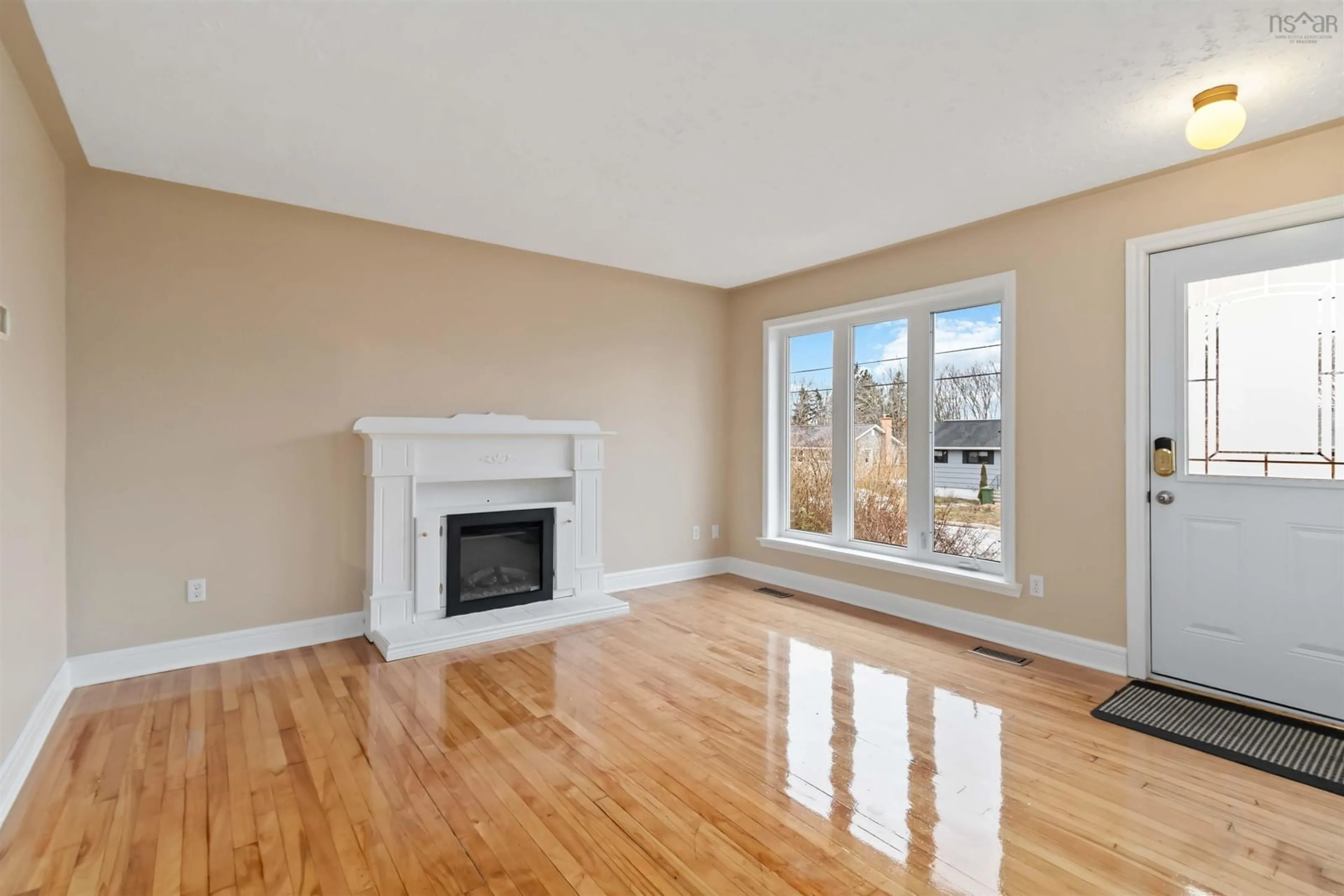 Living room with furniture, wood/laminate floor for 16 Pauline Cres, Dartmouth Nova Scotia B2W 2A6