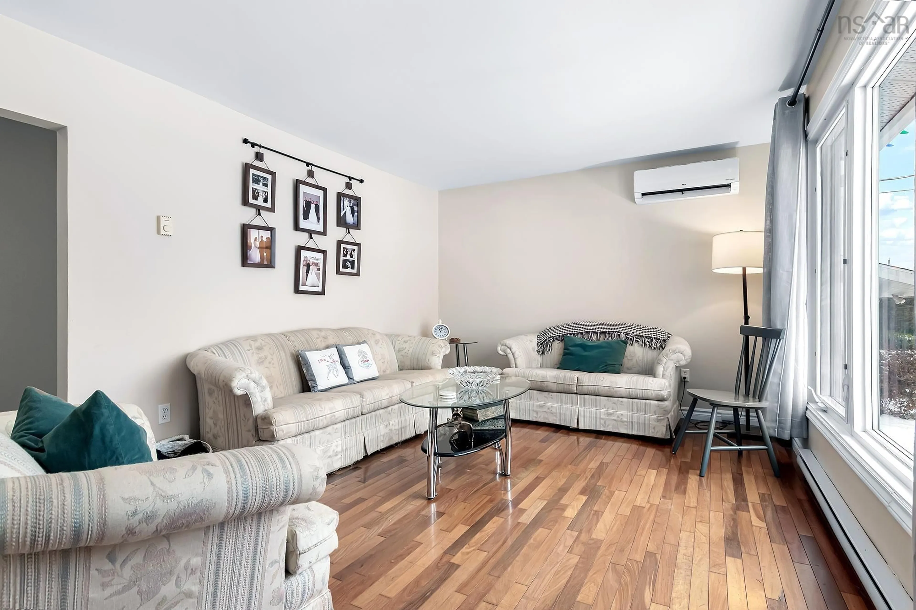 Living room with furniture, wood/laminate floor for 5 Rannoch Rd, Dartmouth Nova Scotia B2X 1J6