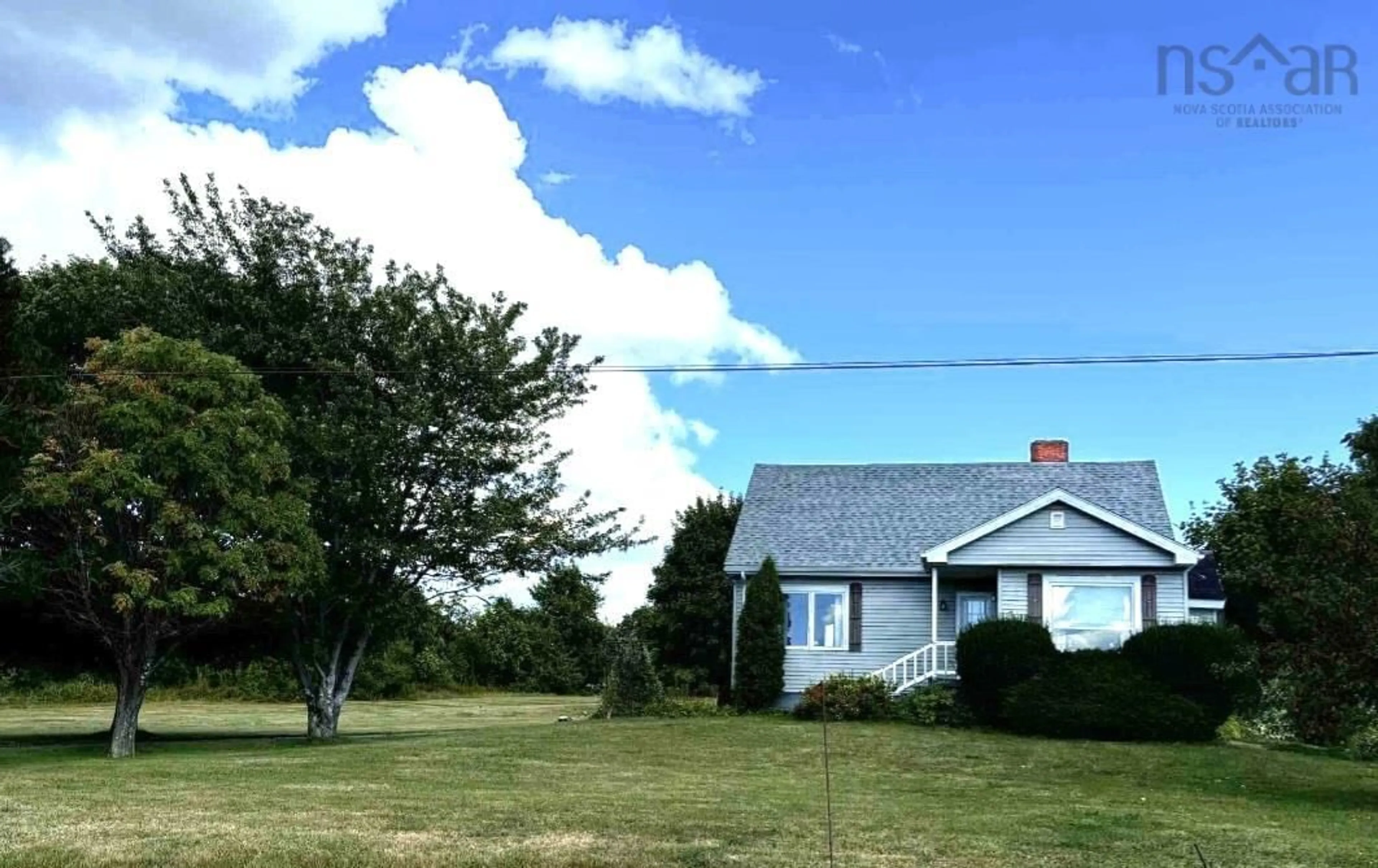 A pic from outside/outdoor area/front of a property/back of a property/a pic from drone, unknown for 399 Church Rd, Little Bras D'Or Nova Scotia B1Y 3A3