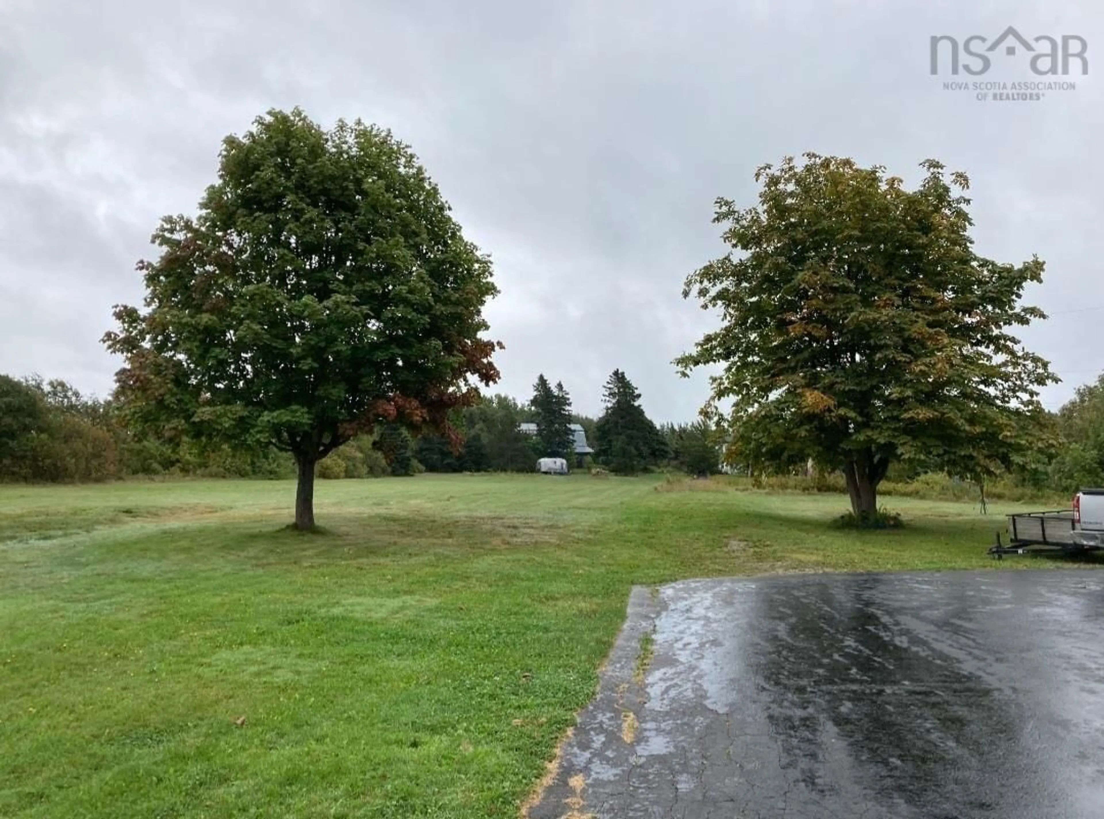 A pic from outside/outdoor area/front of a property/back of a property/a pic from drone, unknown for 399 Church Rd, Little Bras D'Or Nova Scotia B1Y 3A3