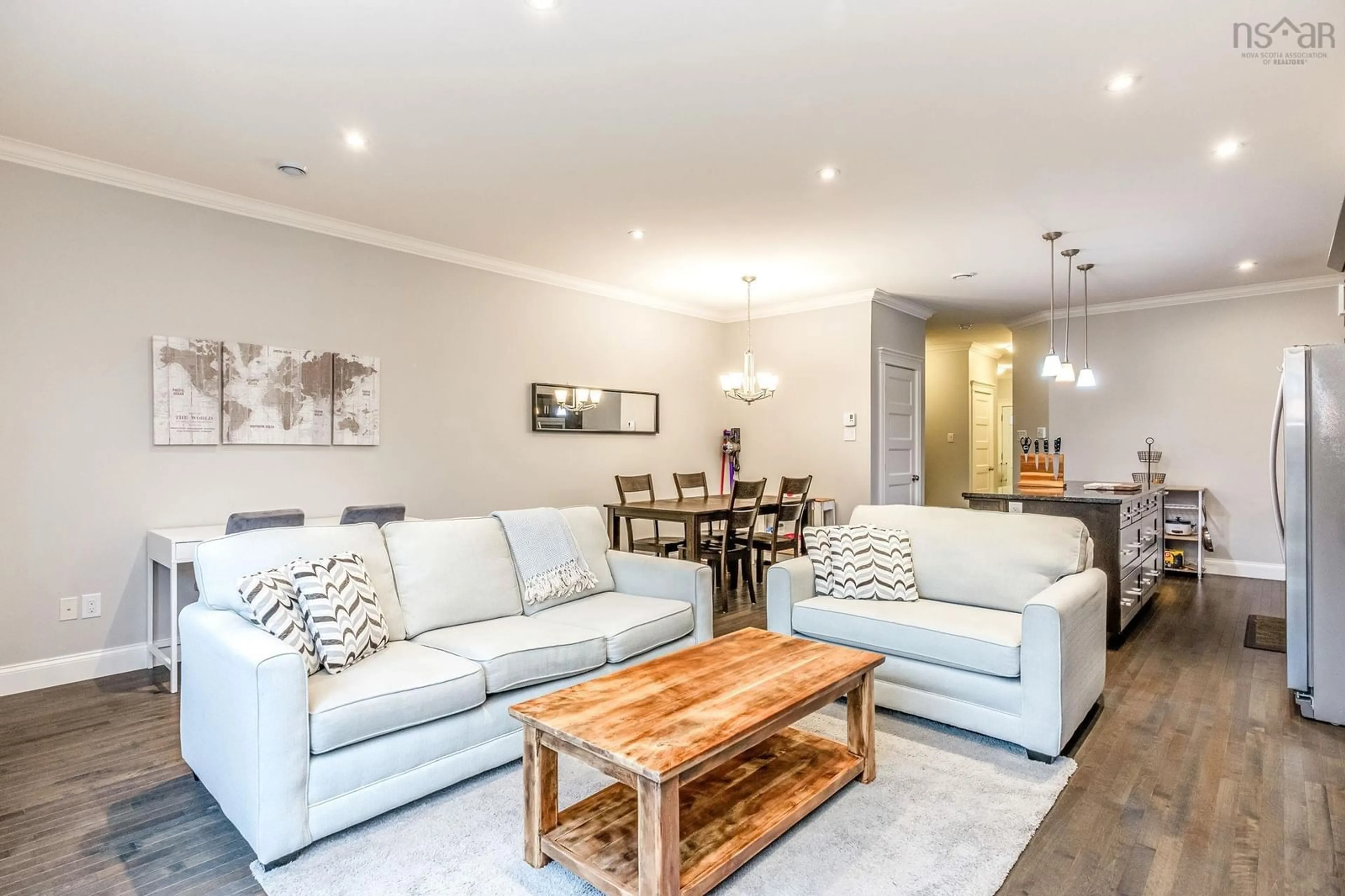 Living room with furniture, wood/laminate floor for 630 Cowie Hill, Halifax Nova Scotia B3N 0E2