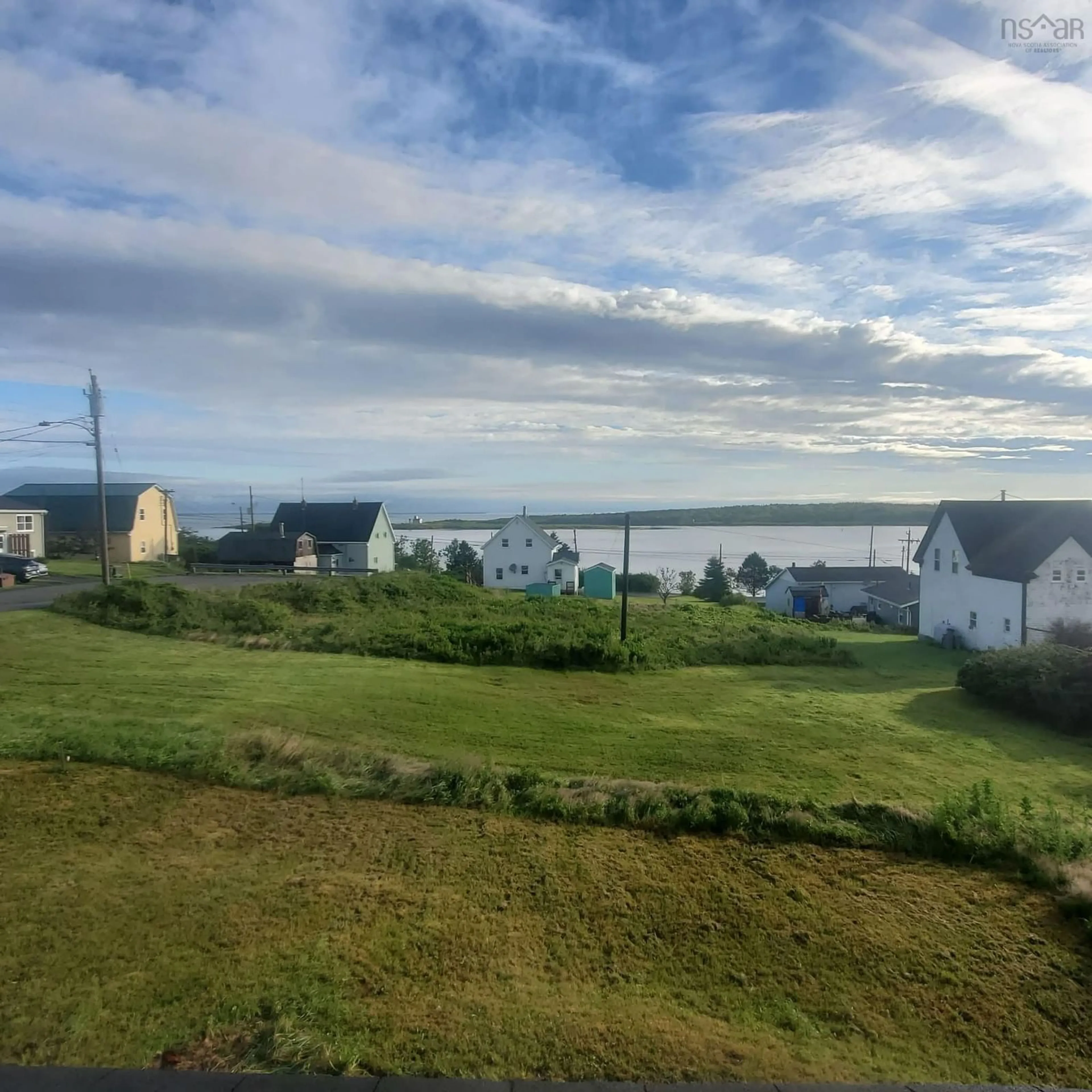A pic from outside/outdoor area/front of a property/back of a property/a pic from drone, water/lake/river/ocean view for 7 Centennial St, Canso Nova Scotia B0H 1H0