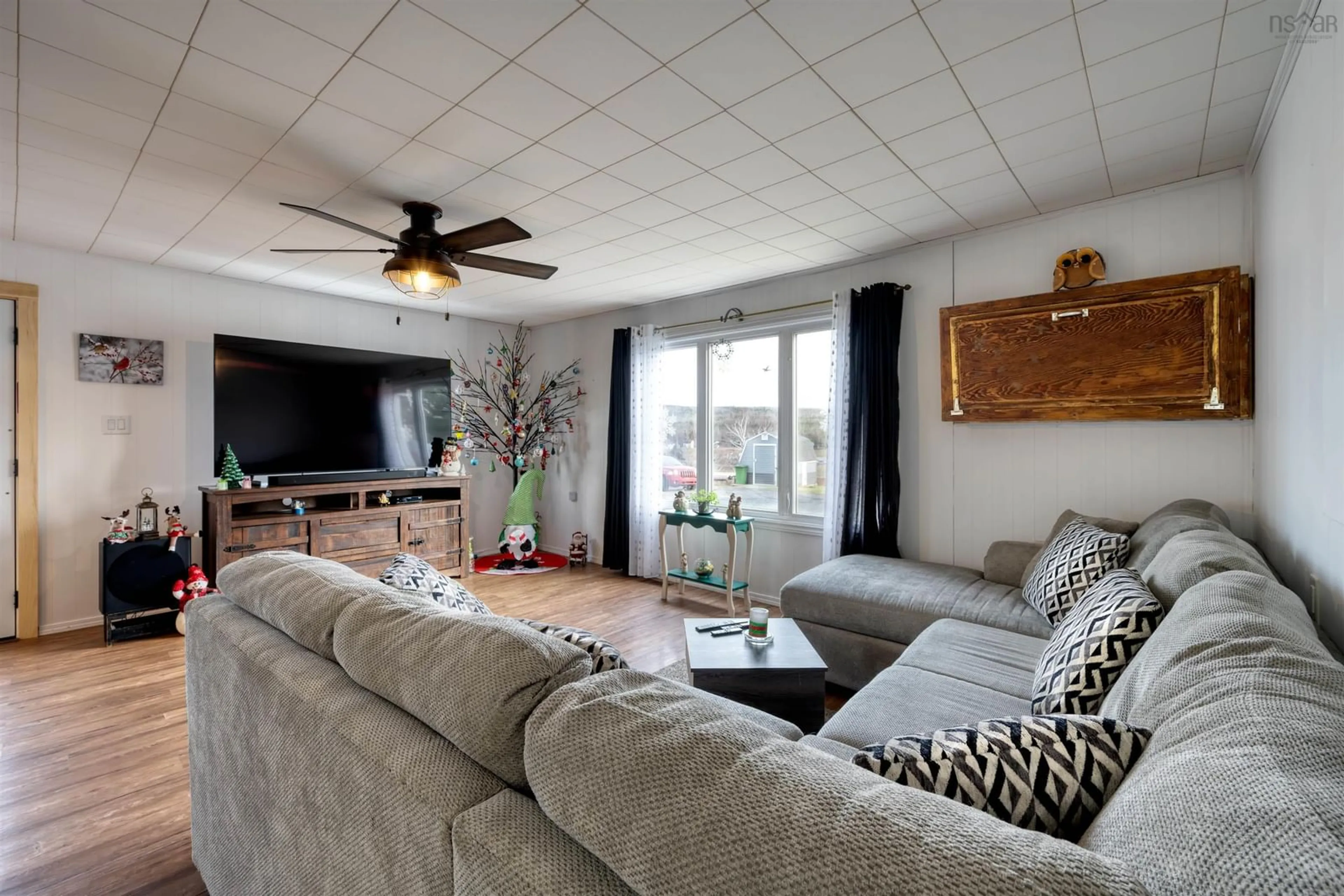 Living room with furniture, unknown for 87 Pool Rd, Sheet Harbour Nova Scotia B0J 3H0