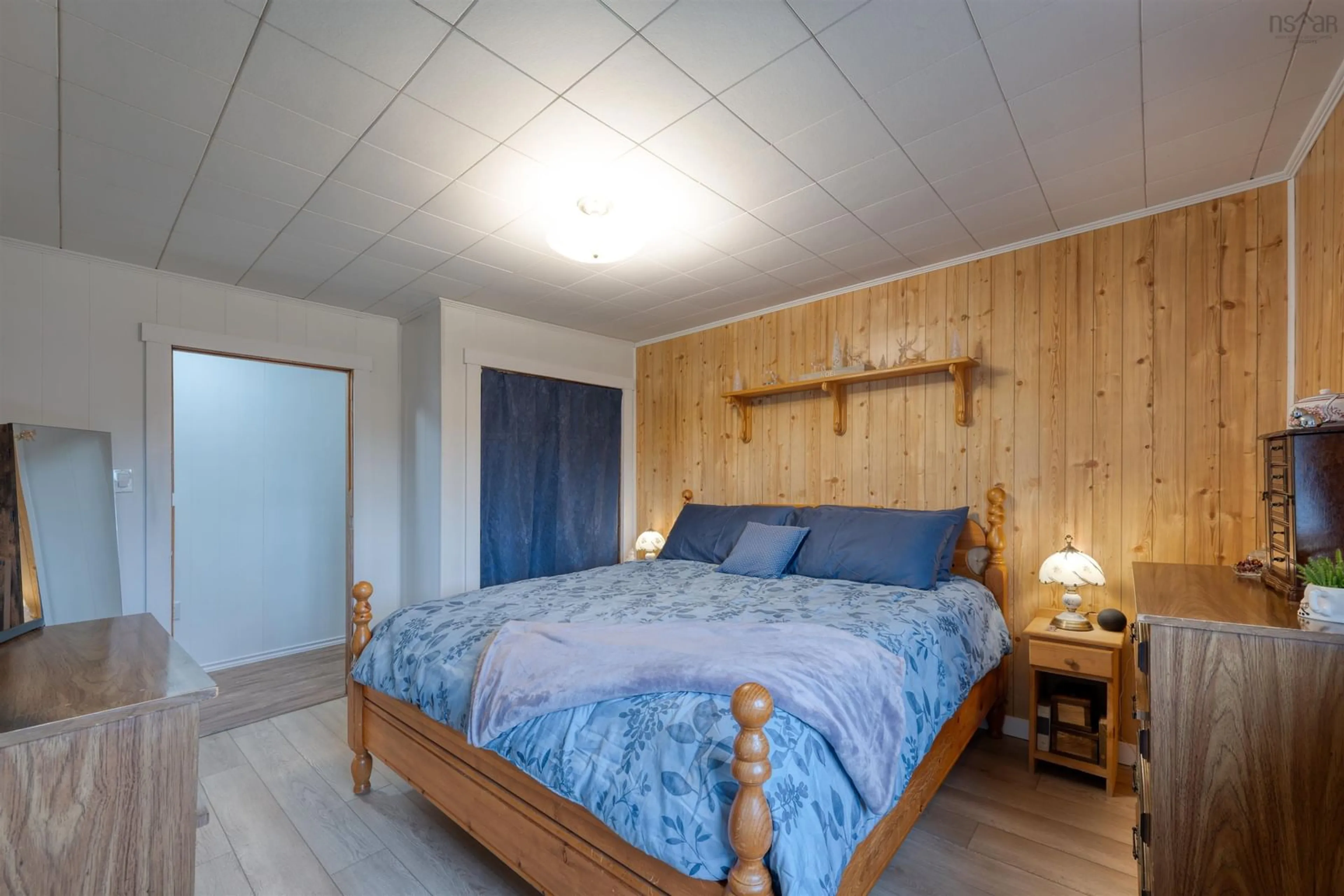 Bedroom with bed, wood/laminate floor for 87 Pool Rd, Sheet Harbour Nova Scotia B0J 3H0