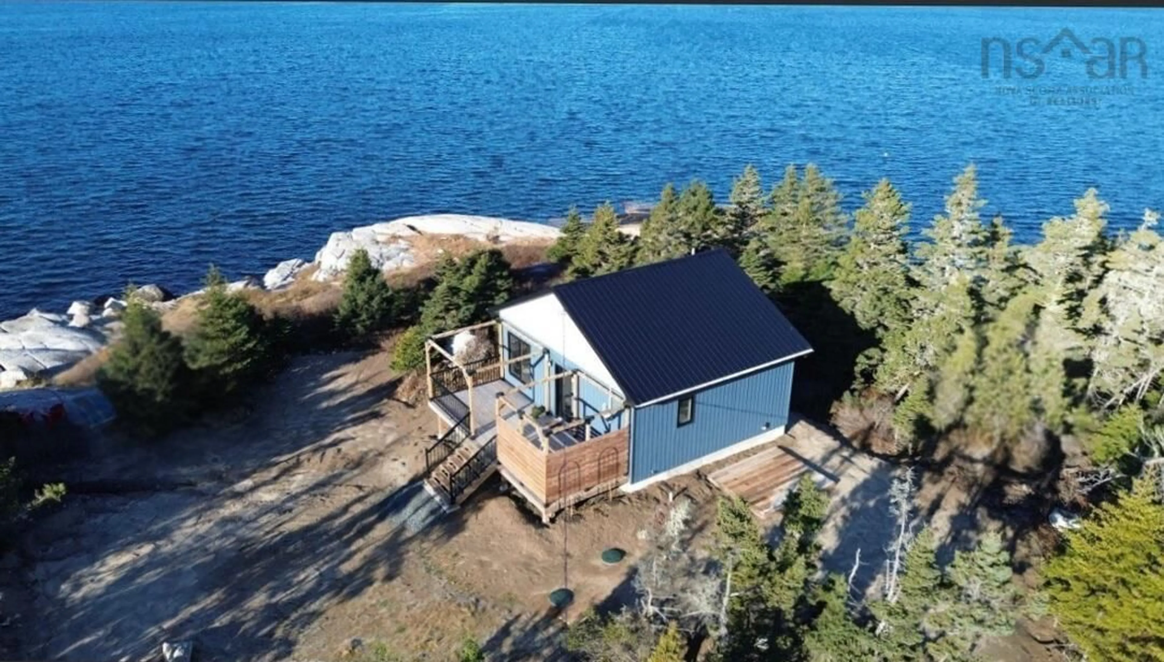 A pic from outside/outdoor area/front of a property/back of a property/a pic from drone, water/lake/river/ocean view for 462 Bald Rock Rd, Sambro Nova Scotia B3V 1K9