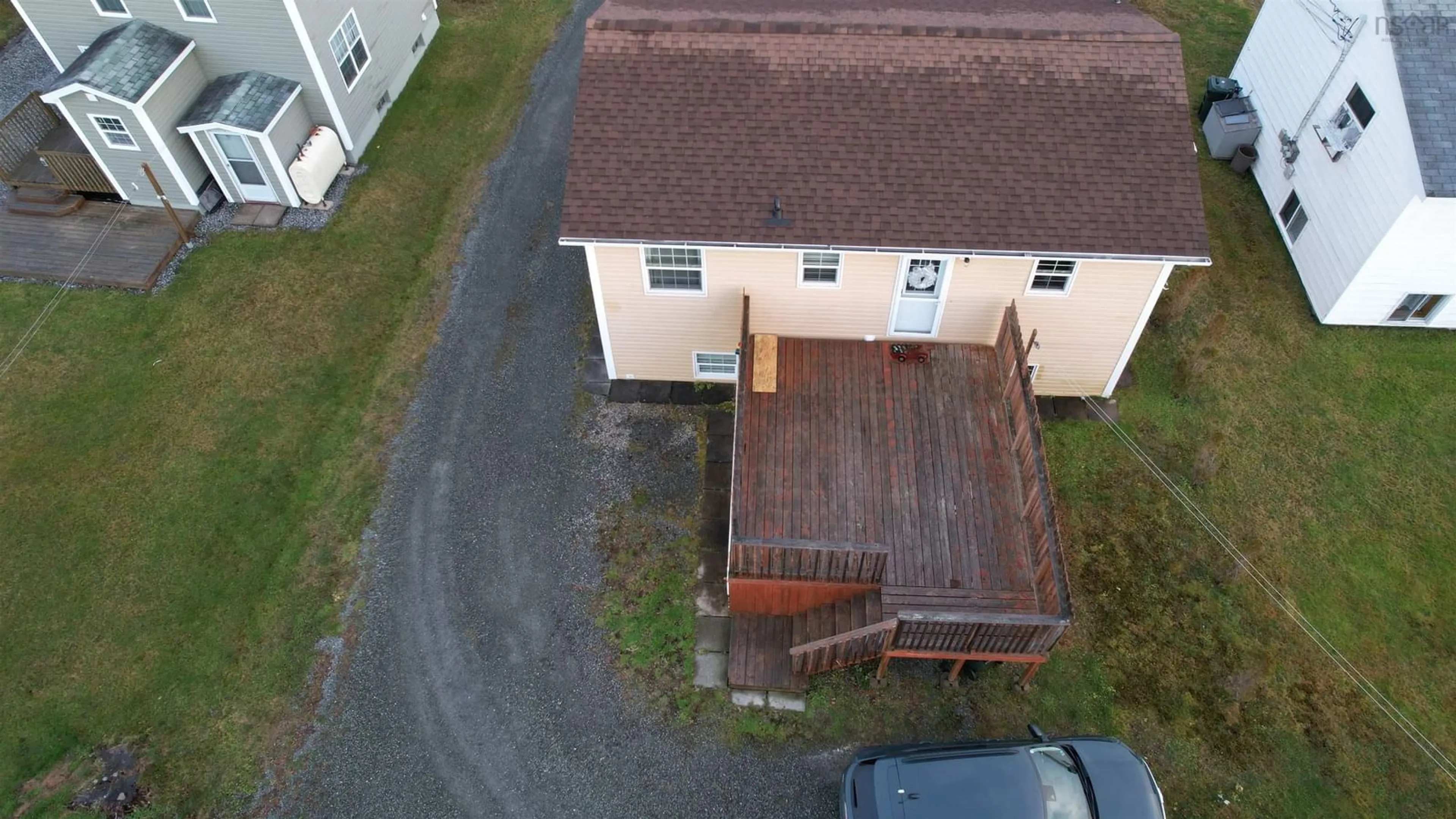 A pic from outside/outdoor area/front of a property/back of a property/a pic from drone, building for 100 Highland St, Glace Bay Nova Scotia B1A 2V1