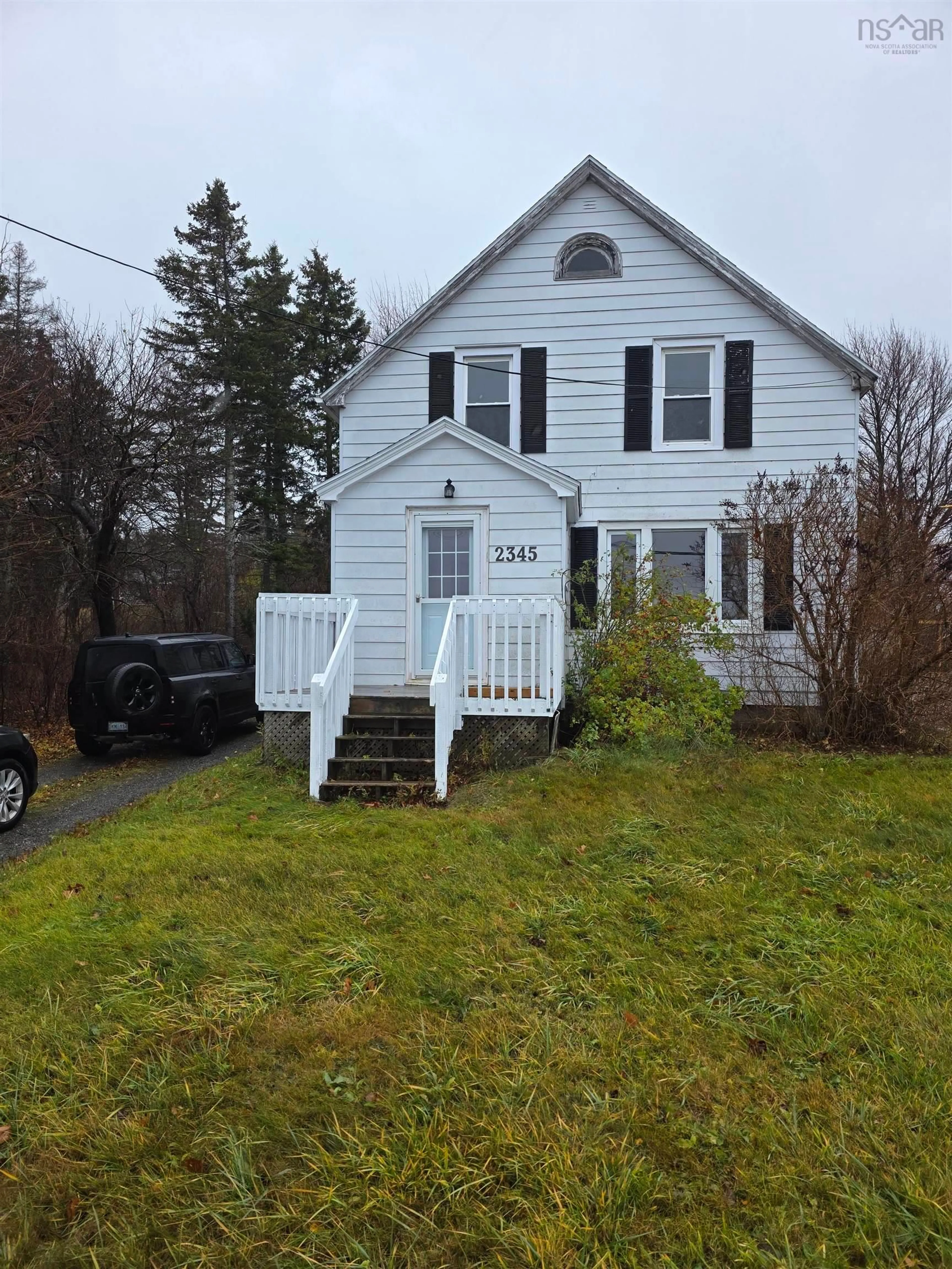 Home with vinyl exterior material, street for 2345 Highway 239 Hwy, Point Edward Nova Scotia B2A 4R3