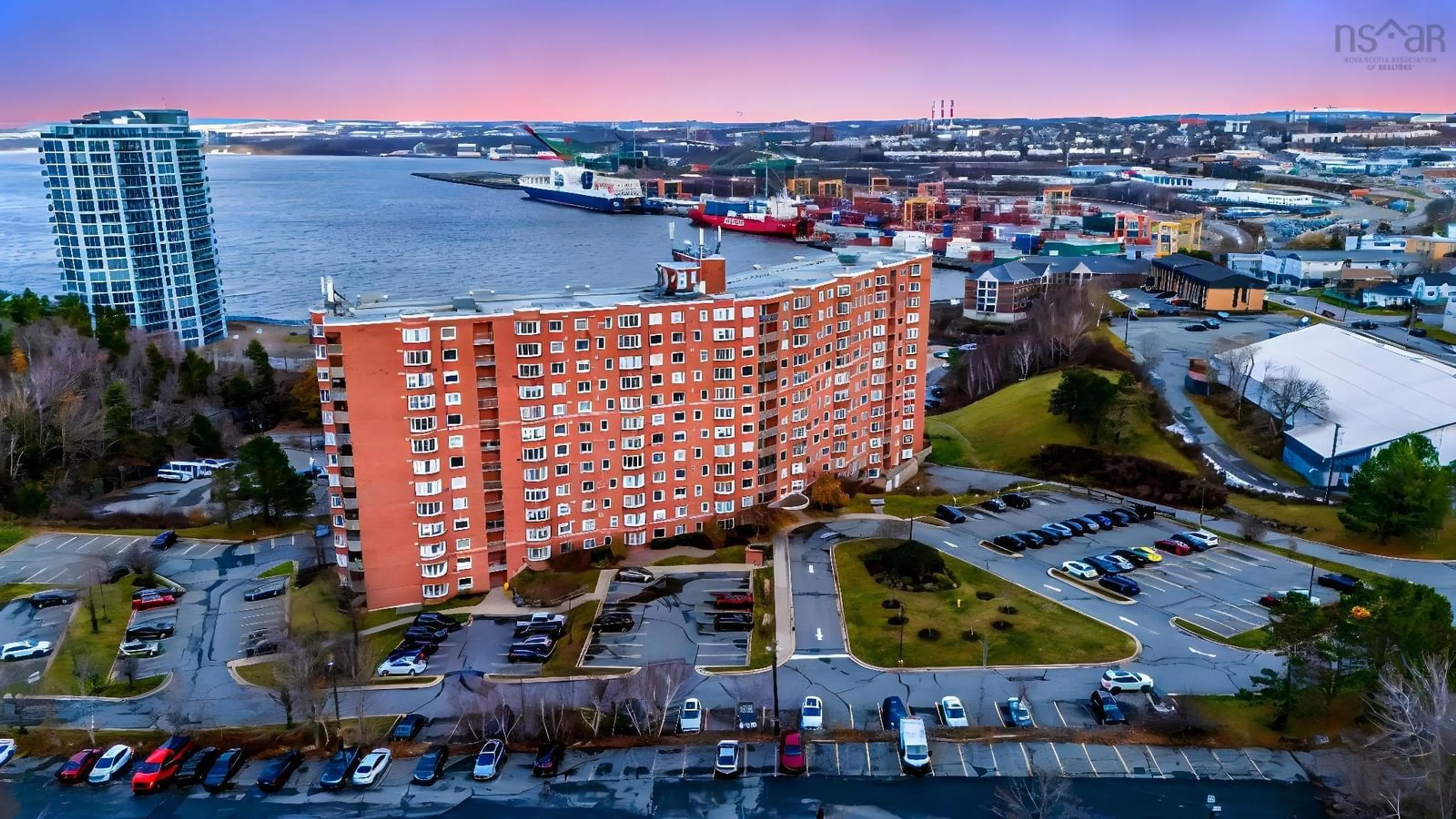 A pic from outside/outdoor area/front of a property/back of a property/a pic from drone, city buildings view from balcony for 45 Vimy Ave. #324, Halifax Nova Scotia B3M 4C5