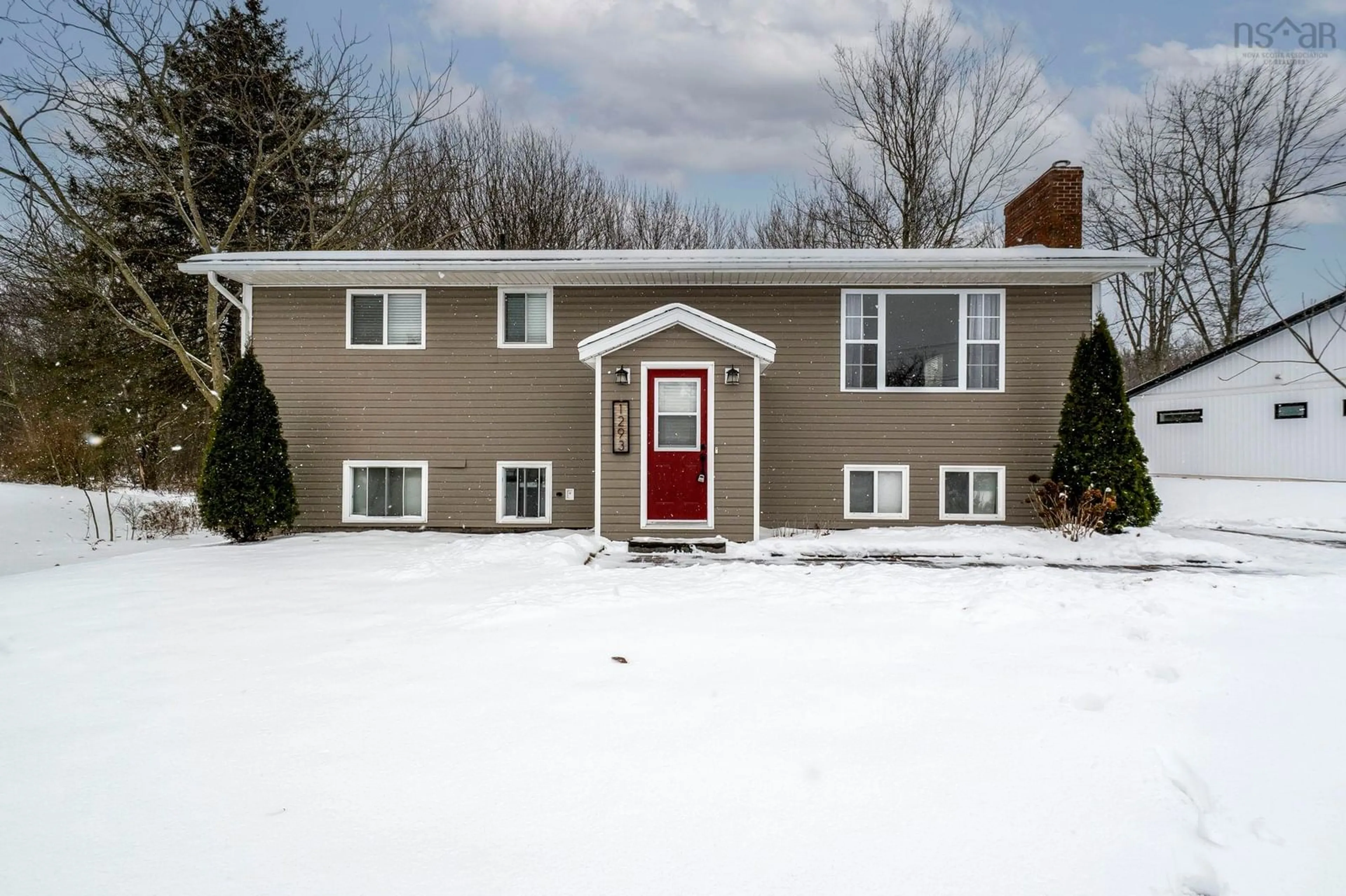 Home with vinyl exterior material, street for 1293 Highway 358, Port Williams Nova Scotia B0P 1T0