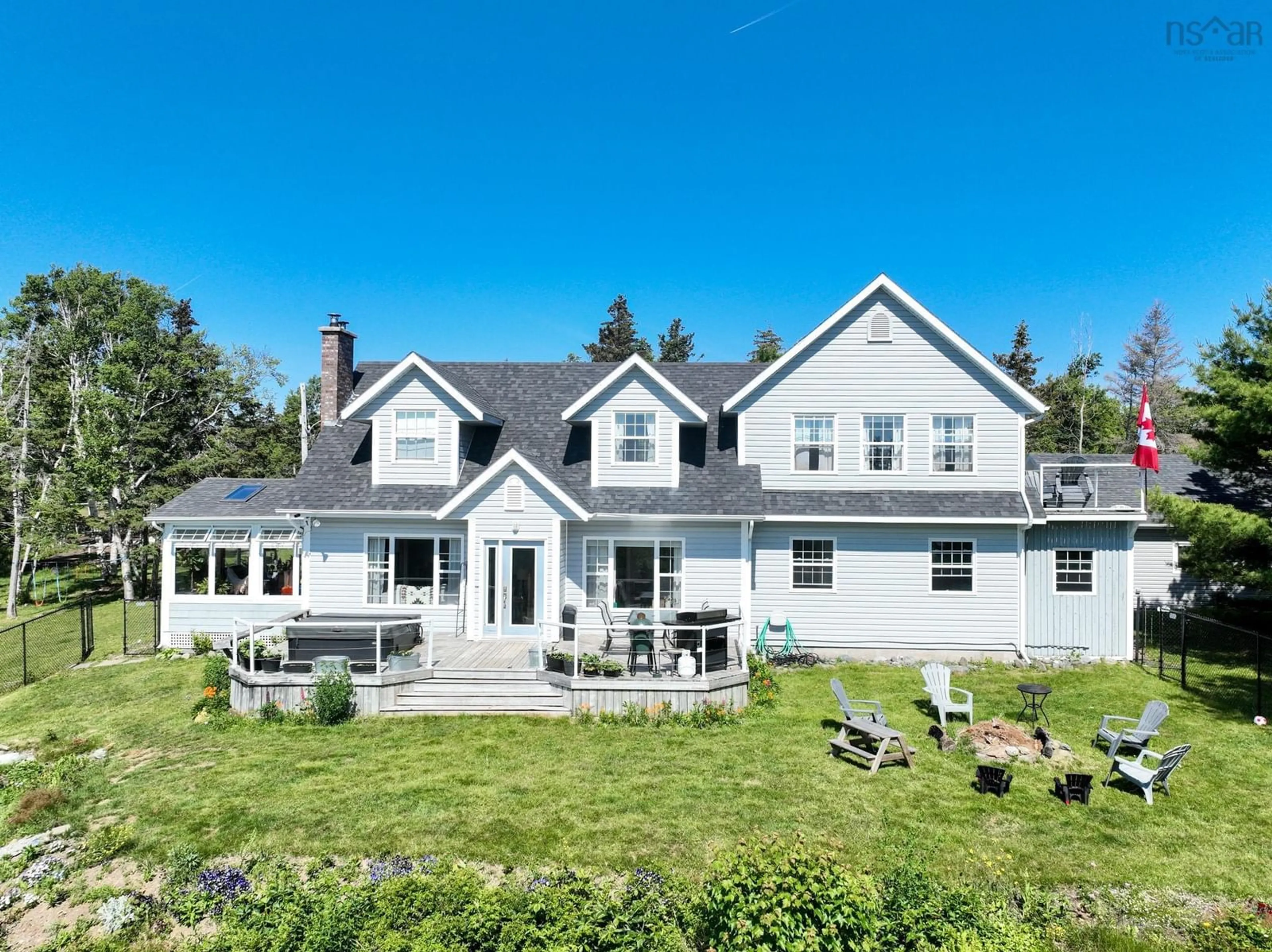 A pic from outside/outdoor area/front of a property/back of a property/a pic from drone, water/lake/river/ocean view for 1470 Brickyard Rd, Mira Gut Nova Scotia B1K 2V7