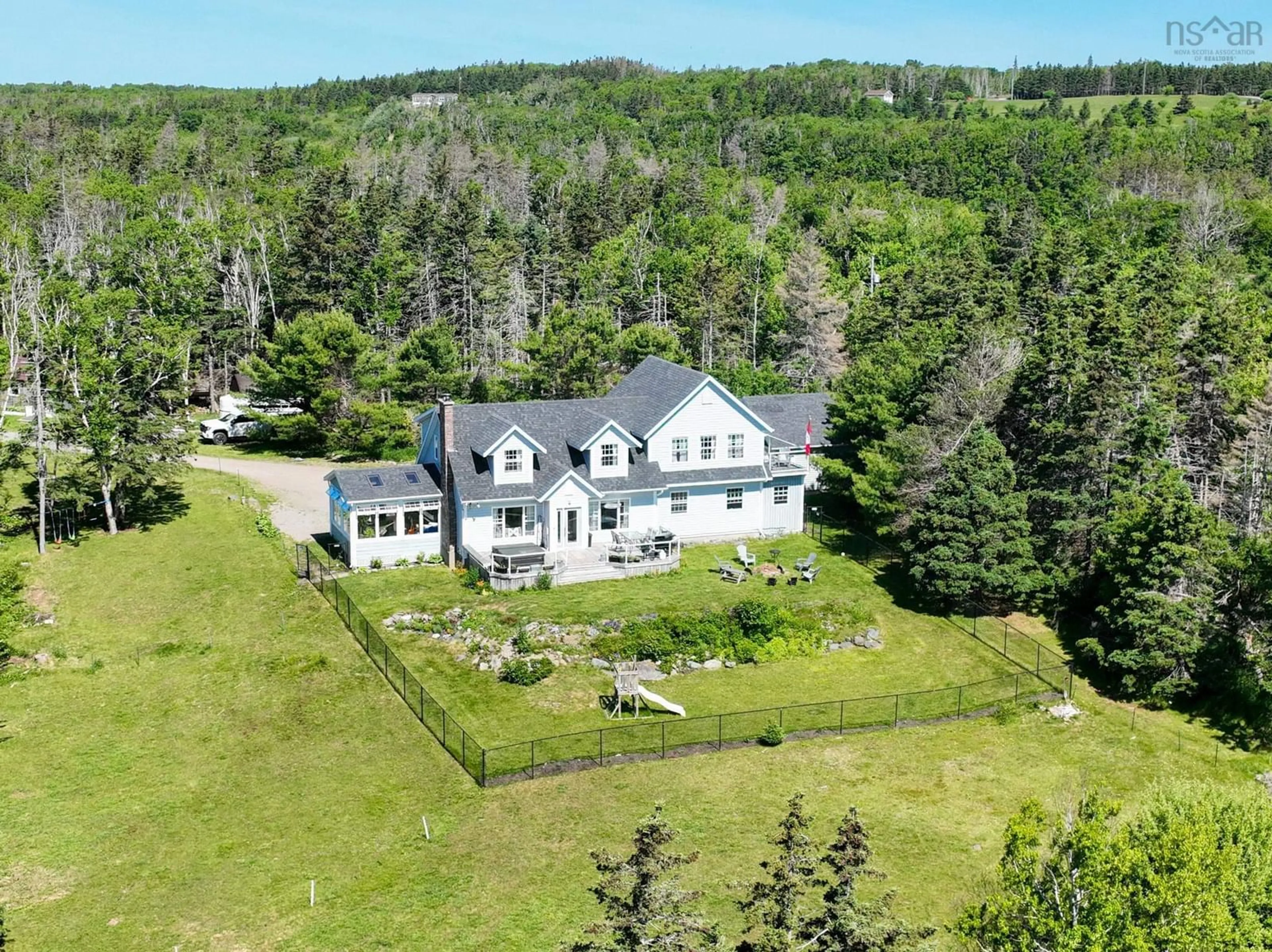 A pic from outside/outdoor area/front of a property/back of a property/a pic from drone, unknown for 1470 Brickyard Rd, Mira Gut Nova Scotia B1K 2V7