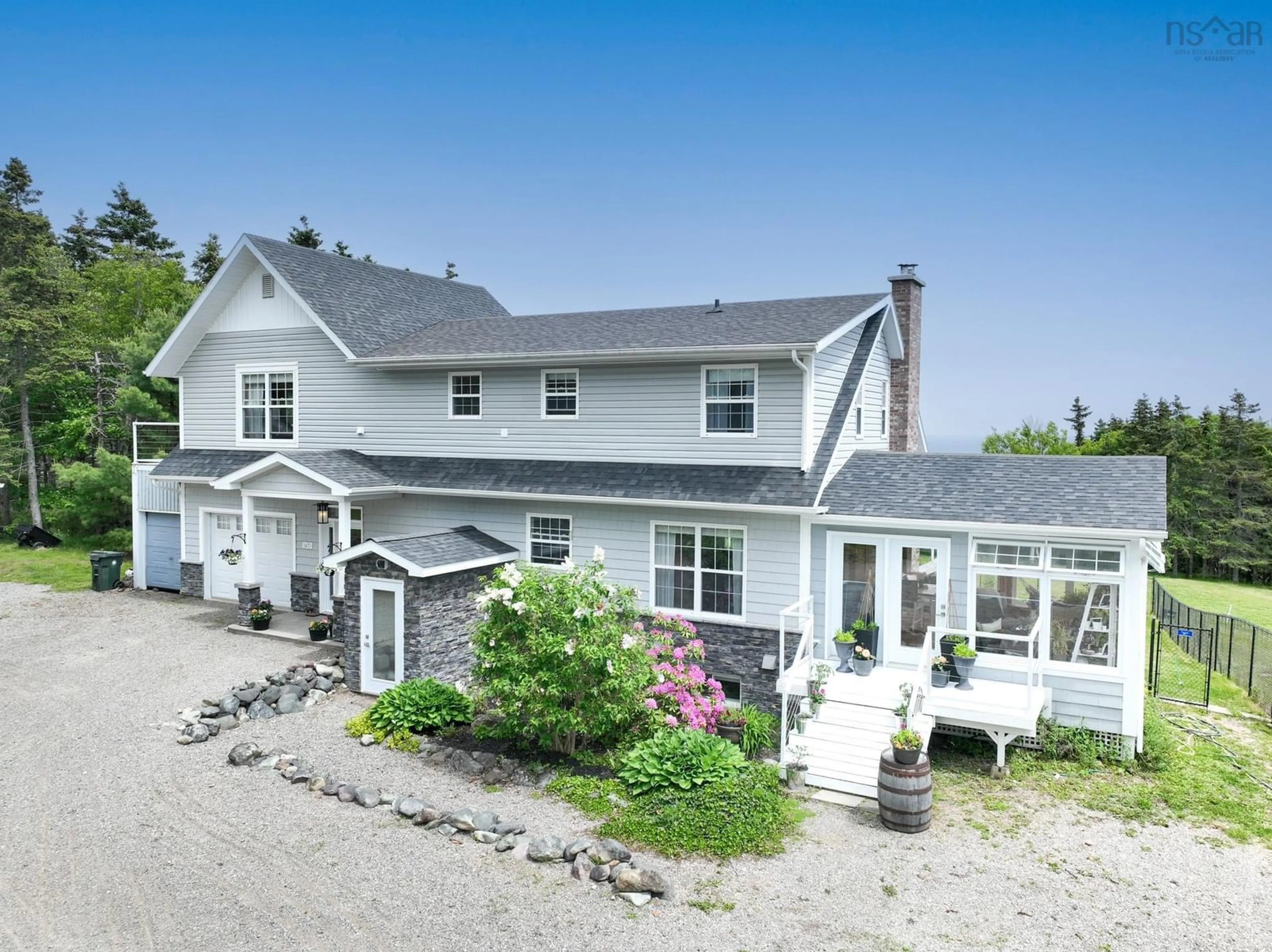 A pic from outside/outdoor area/front of a property/back of a property/a pic from drone, unknown for 1470 Brickyard Rd, Mira Gut Nova Scotia B1K 2V7