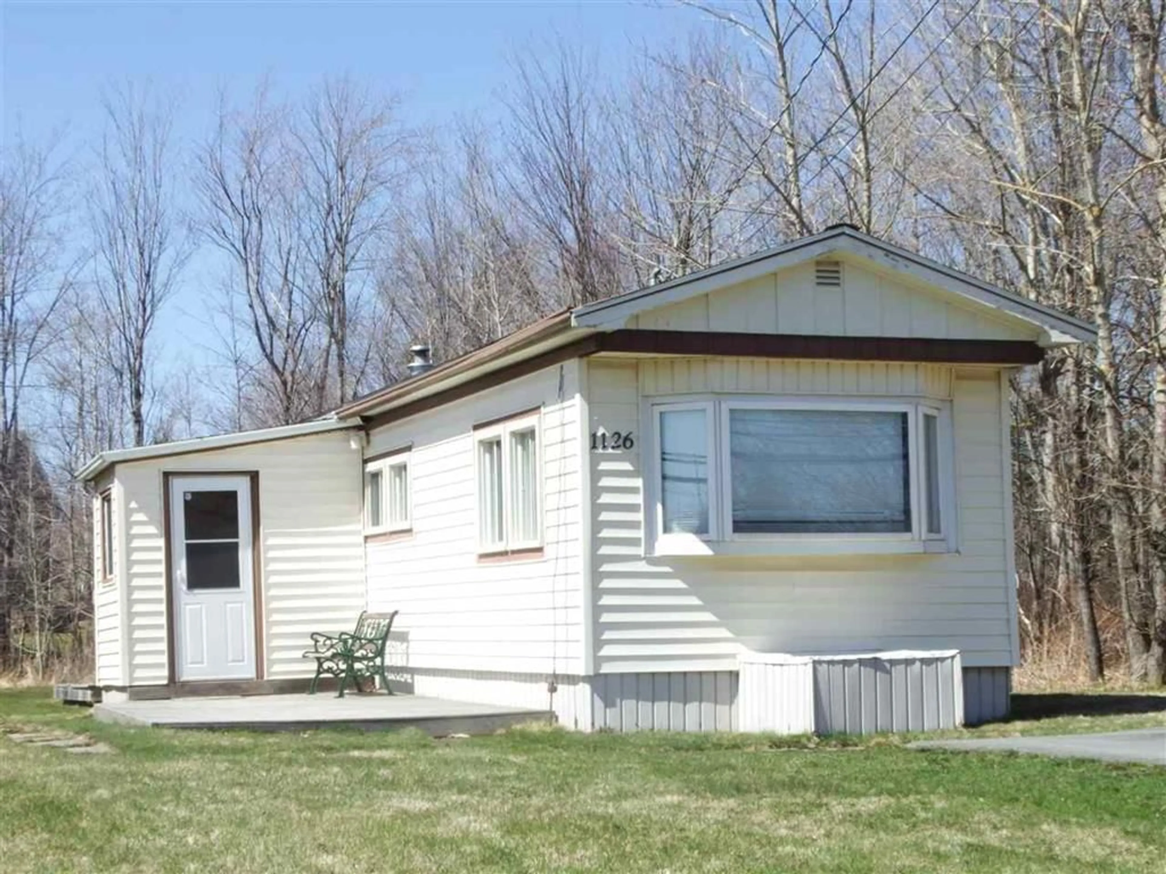 Home with vinyl exterior material, street for 1126 Highway 2, Hants Nova Scotia B2S 1M8