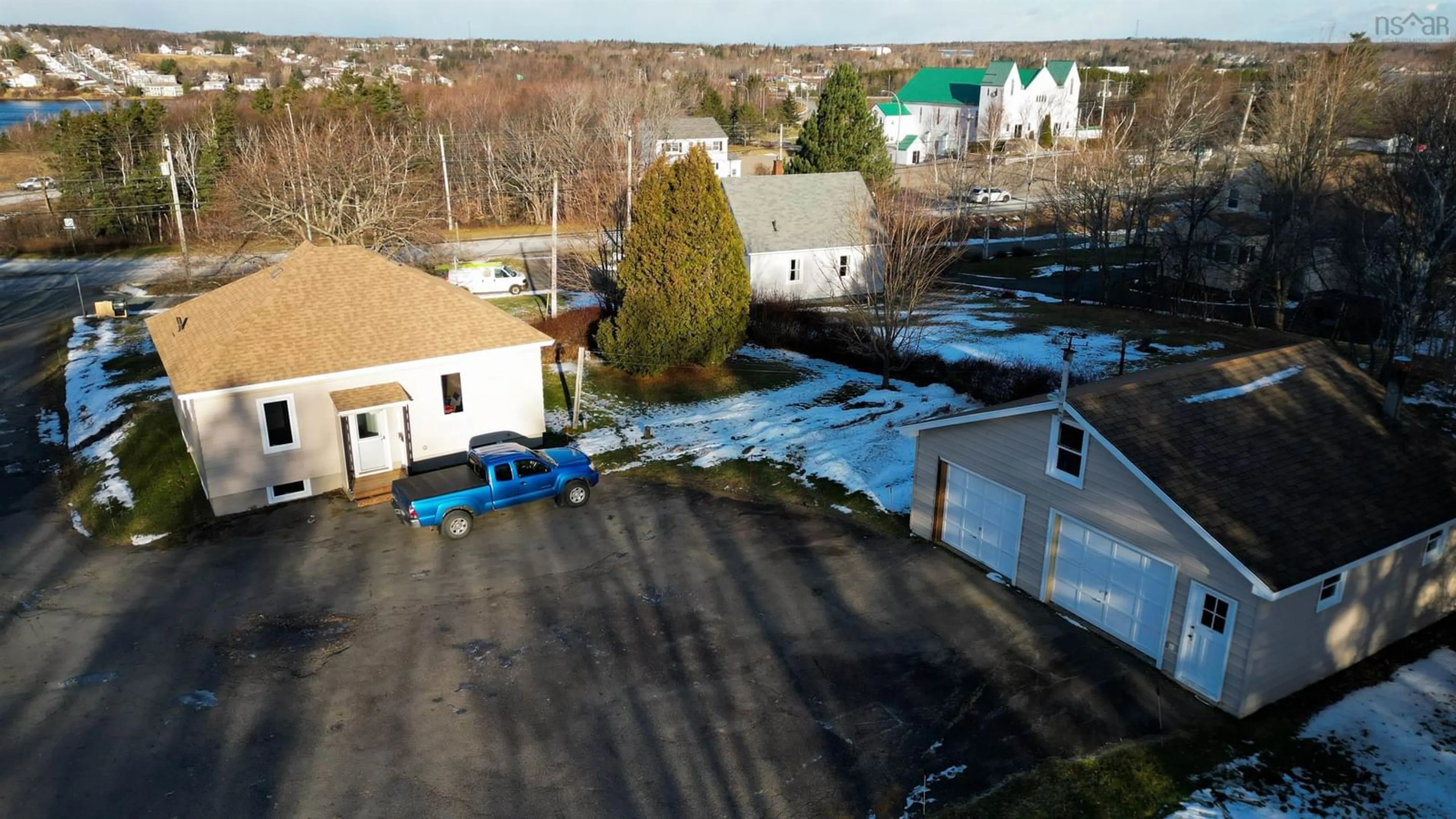 A pic from outside/outdoor area/front of a property/back of a property/a pic from drone, unknown for 17 Howie Drive, Sydney River Nova Scotia B1S 1K8