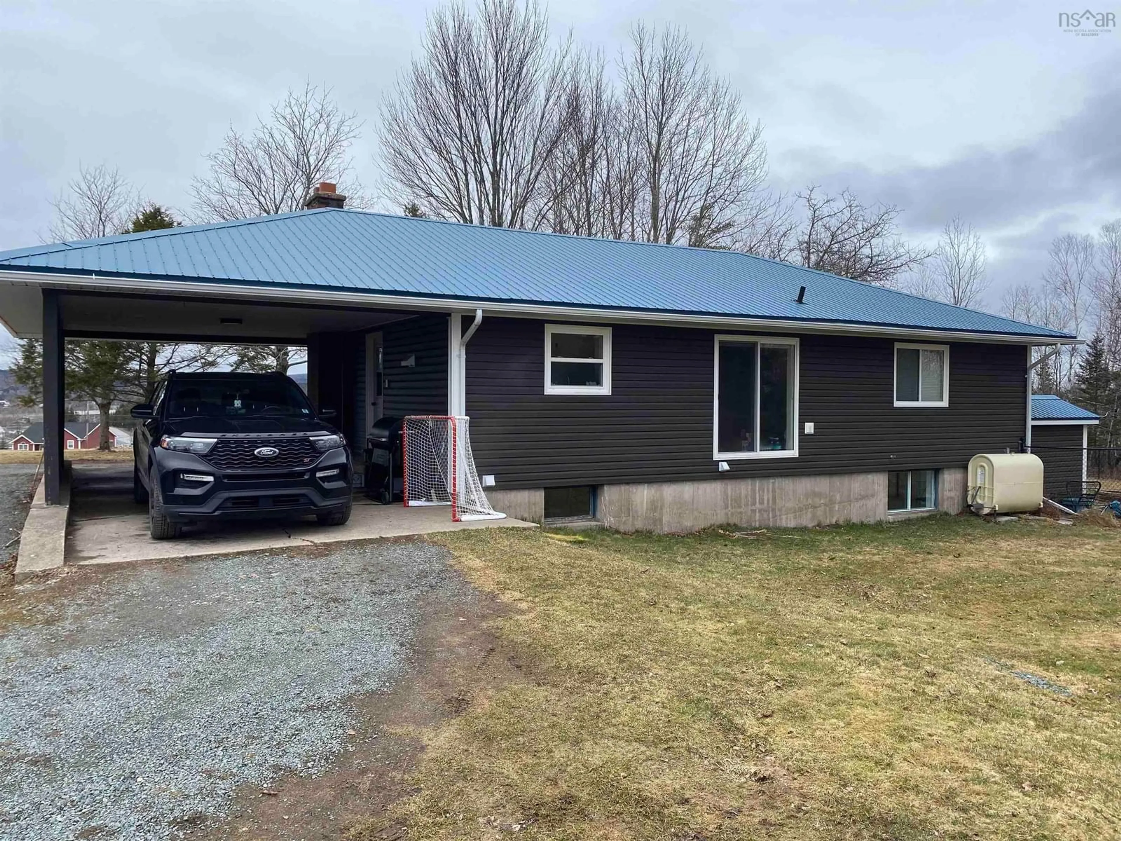 Home with vinyl exterior material, street for 25 Garvie Branch Road, West River Nova Scotia B2G 3A3