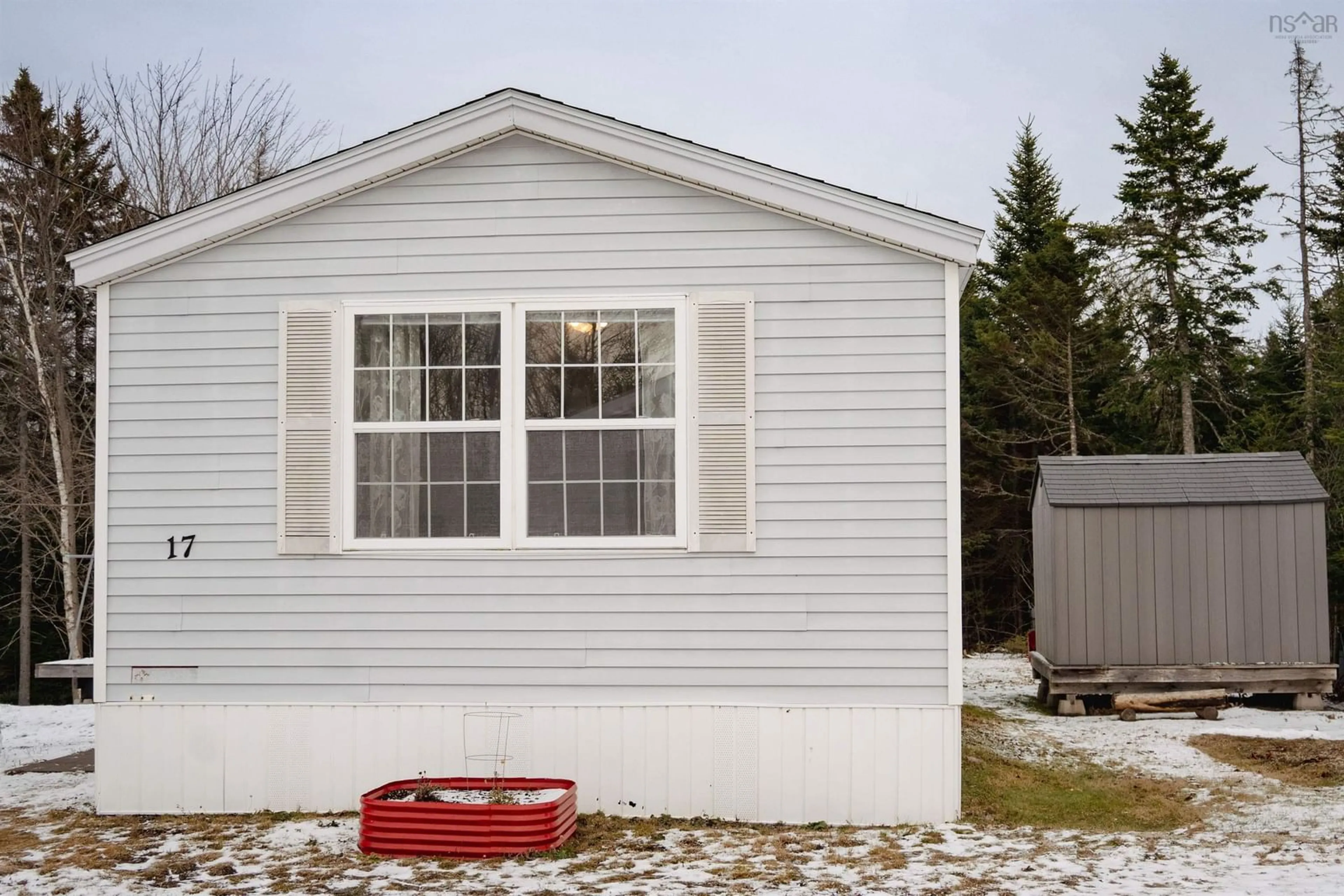 Home with vinyl exterior material, street for 17 Cook Dr, East River Nova Scotia B0J 1T0