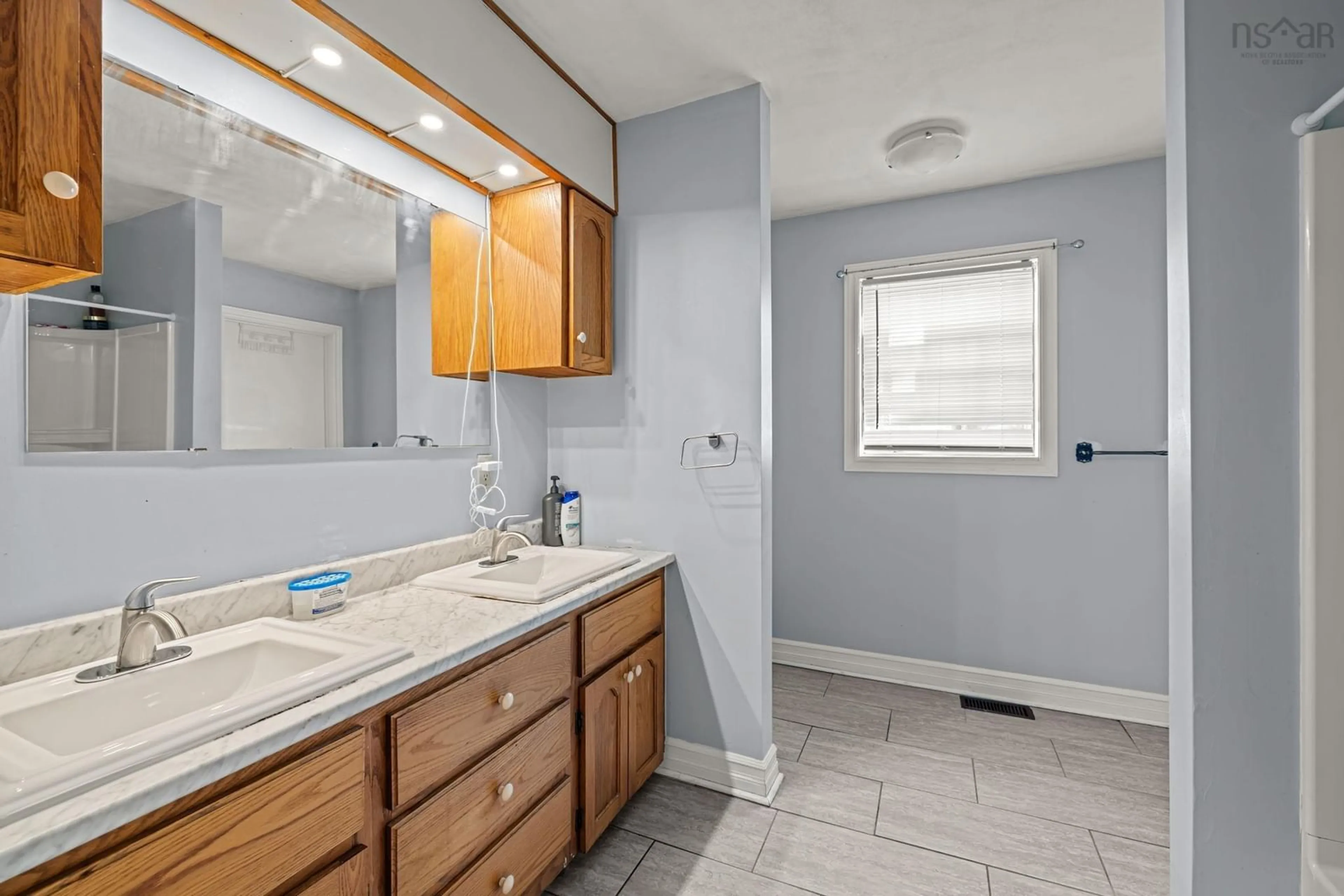 Standard bathroom, ceramic/tile floor for 46 Kearney Lake Rd, Halifax Nova Scotia B3M 2S7