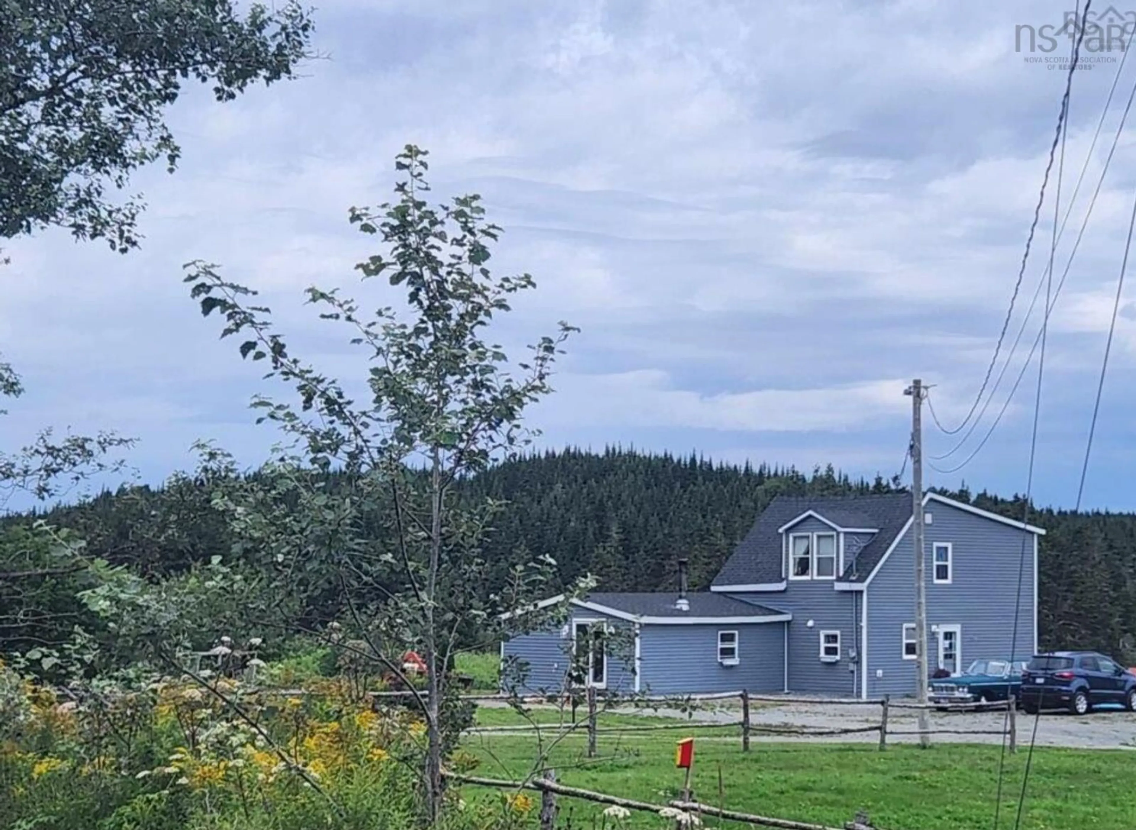 A pic from outside/outdoor area/front of a property/back of a property/a pic from drone, mountain view for 1379 Salmon River Rd, L'Ardoise Nova Scotia B0E 1S0
