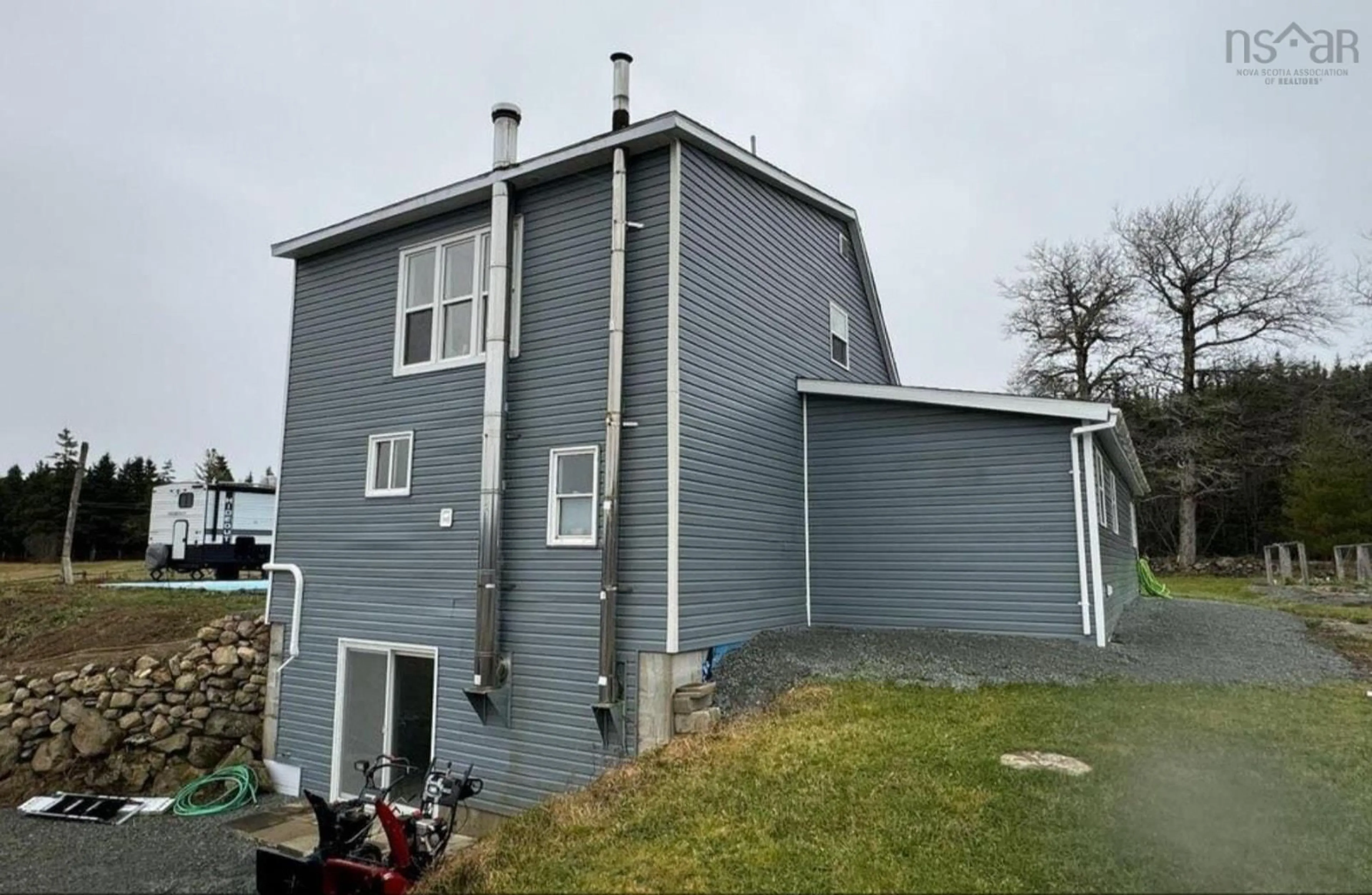 Home with vinyl exterior material, building for 1379 Salmon River Rd, L'Ardoise Nova Scotia B0E 1S0