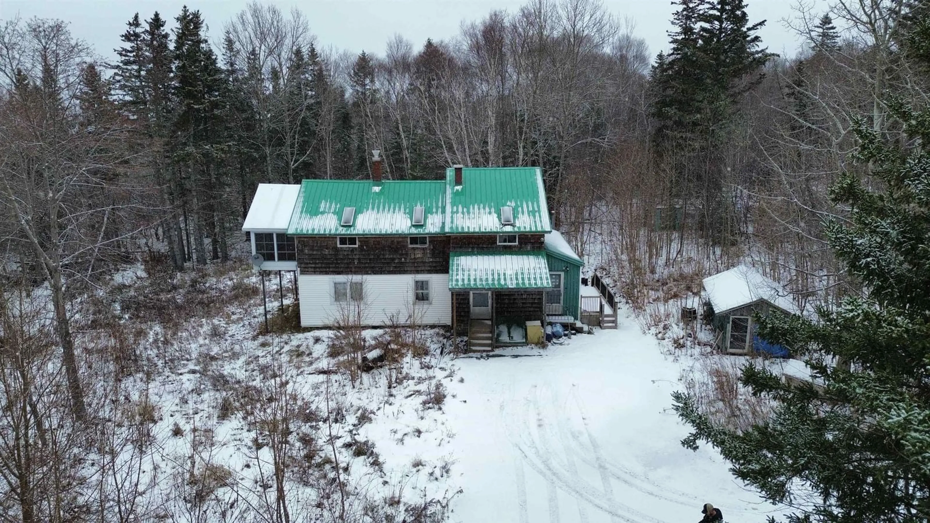 A pic from outside/outdoor area/front of a property/back of a property/a pic from drone, building for 1478 Old Route 5, Big Bras D'Or Nova Scotia B1X 1C1