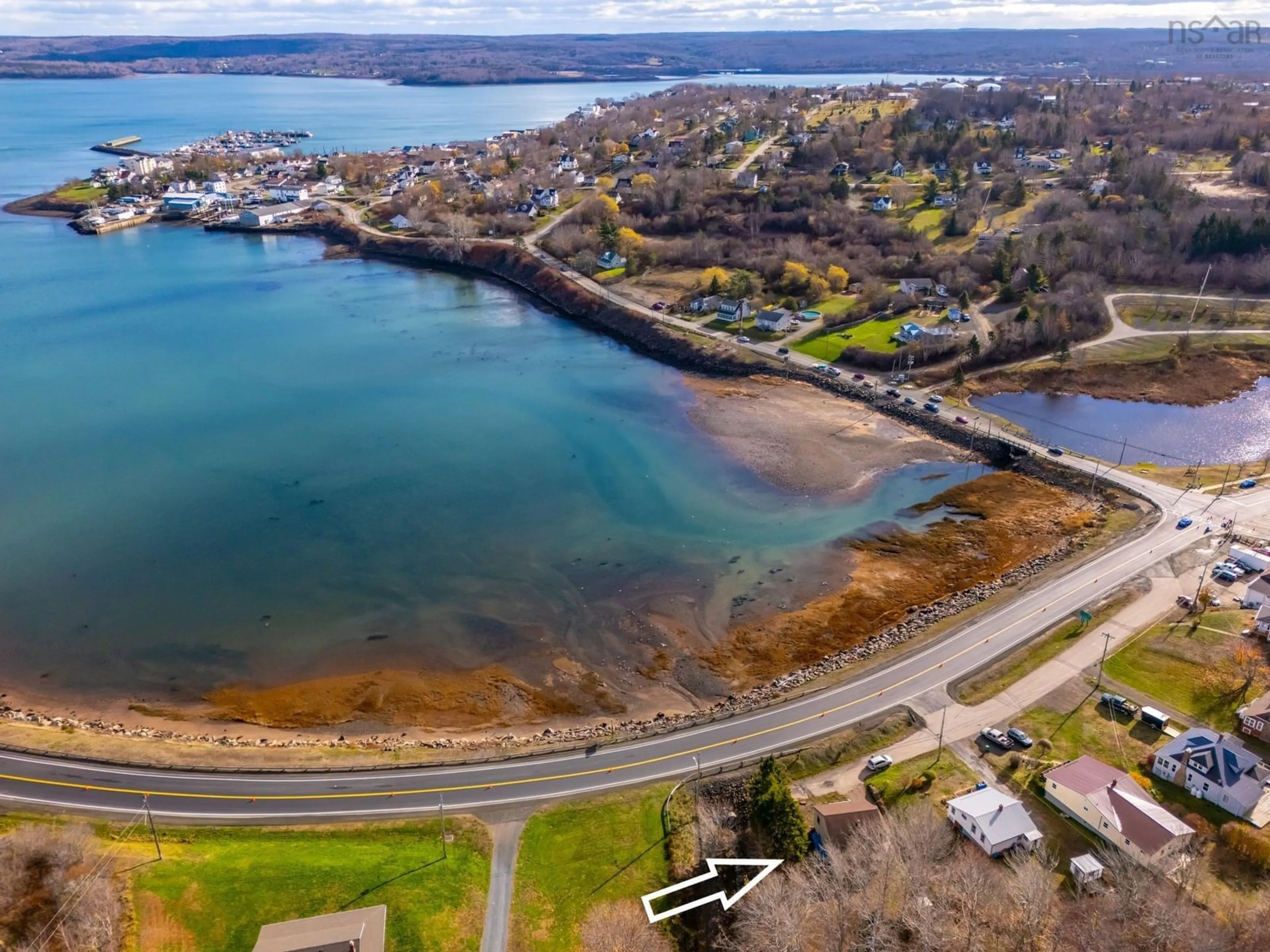 A pic from outside/outdoor area/front of a property/back of a property/a pic from drone, water/lake/river/ocean view for 15 Shore Rd, Digby Nova Scotia B0V 1A0