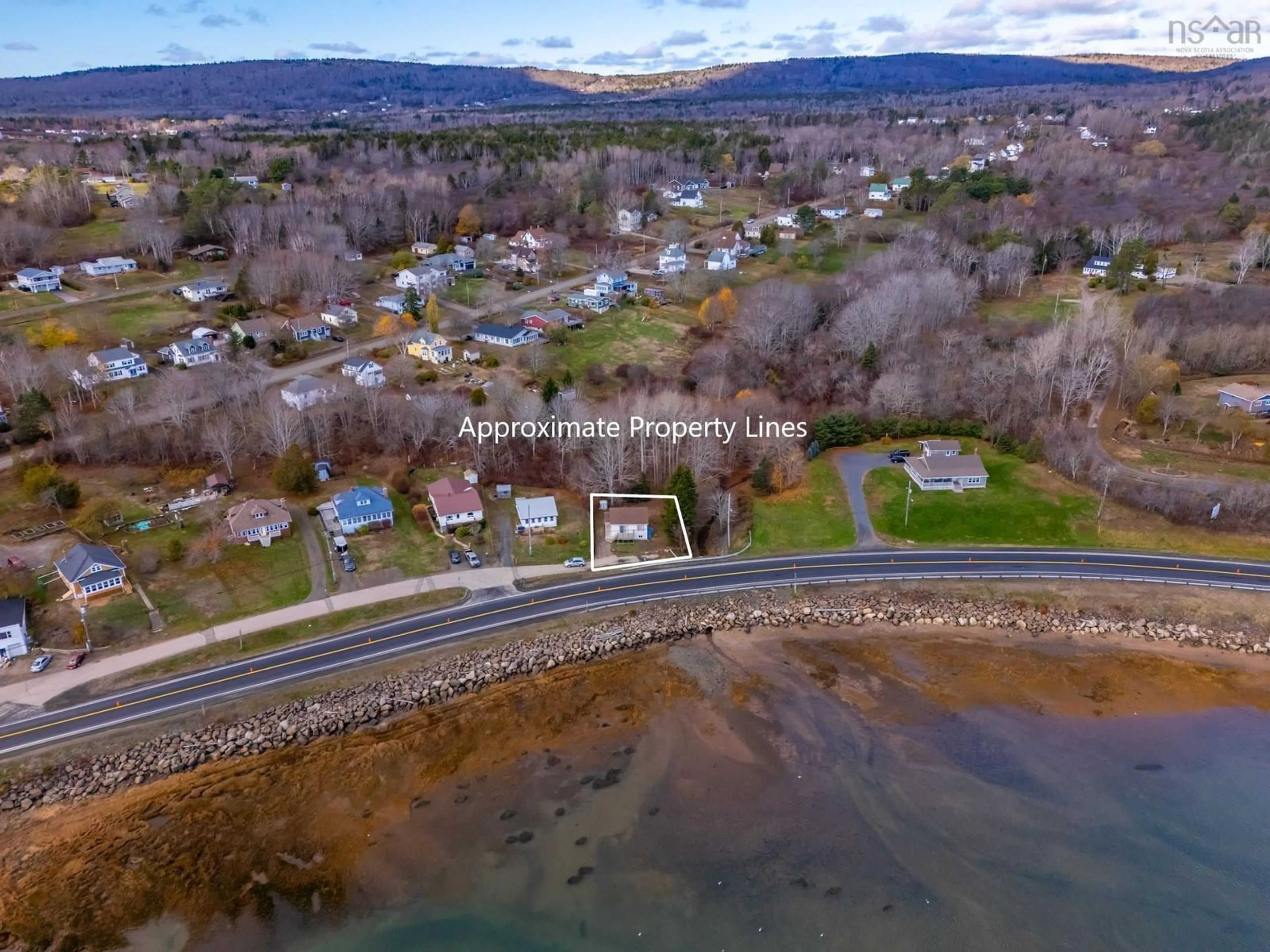 A pic from outside/outdoor area/front of a property/back of a property/a pic from drone, water/lake/river/ocean view for 15 Shore Rd, Digby Nova Scotia B0V 1A0