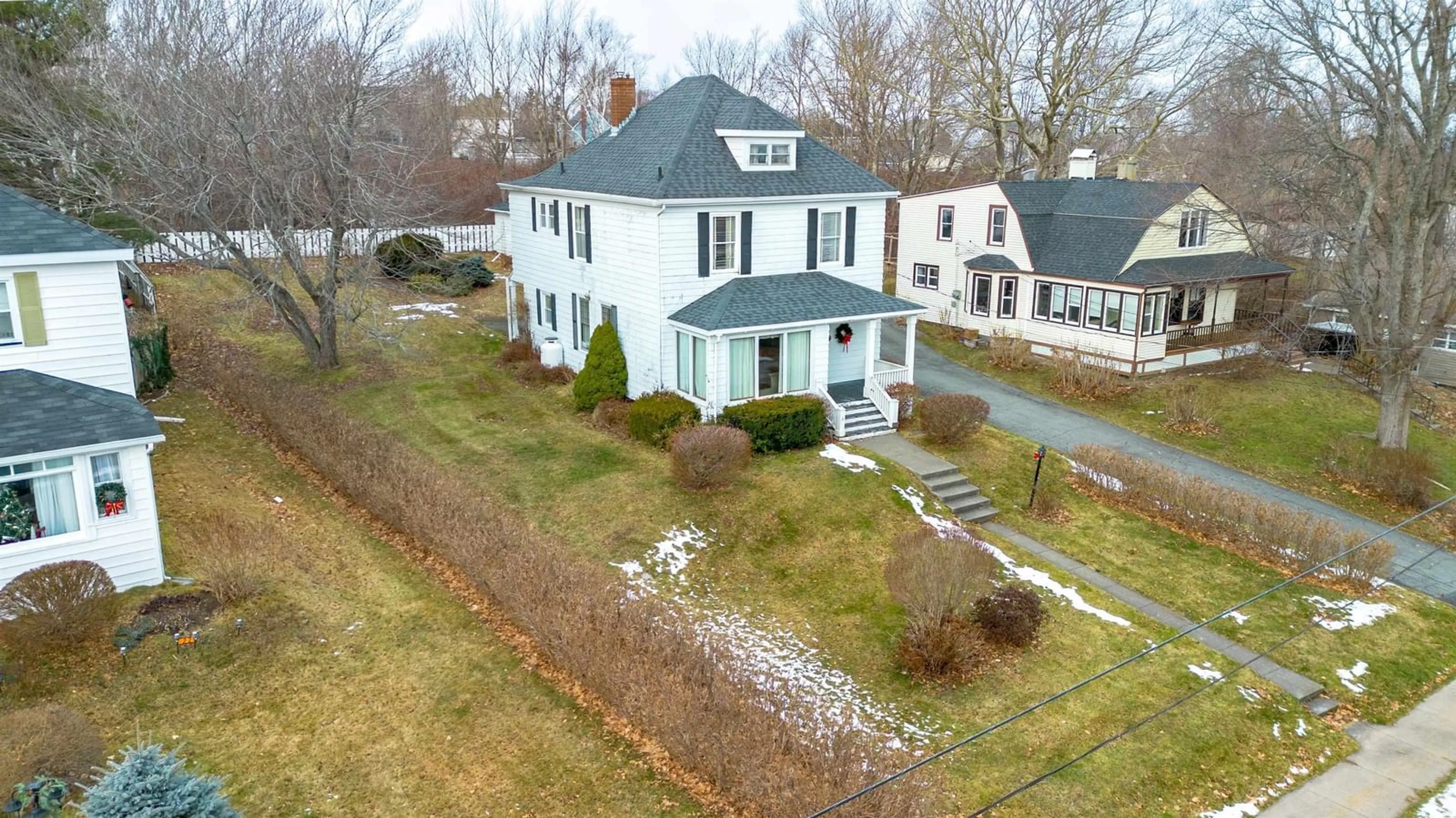 A pic from outside/outdoor area/front of a property/back of a property/a pic from drone, unknown for 20 Brown St, Sydney Mines Nova Scotia B1V 2Y5