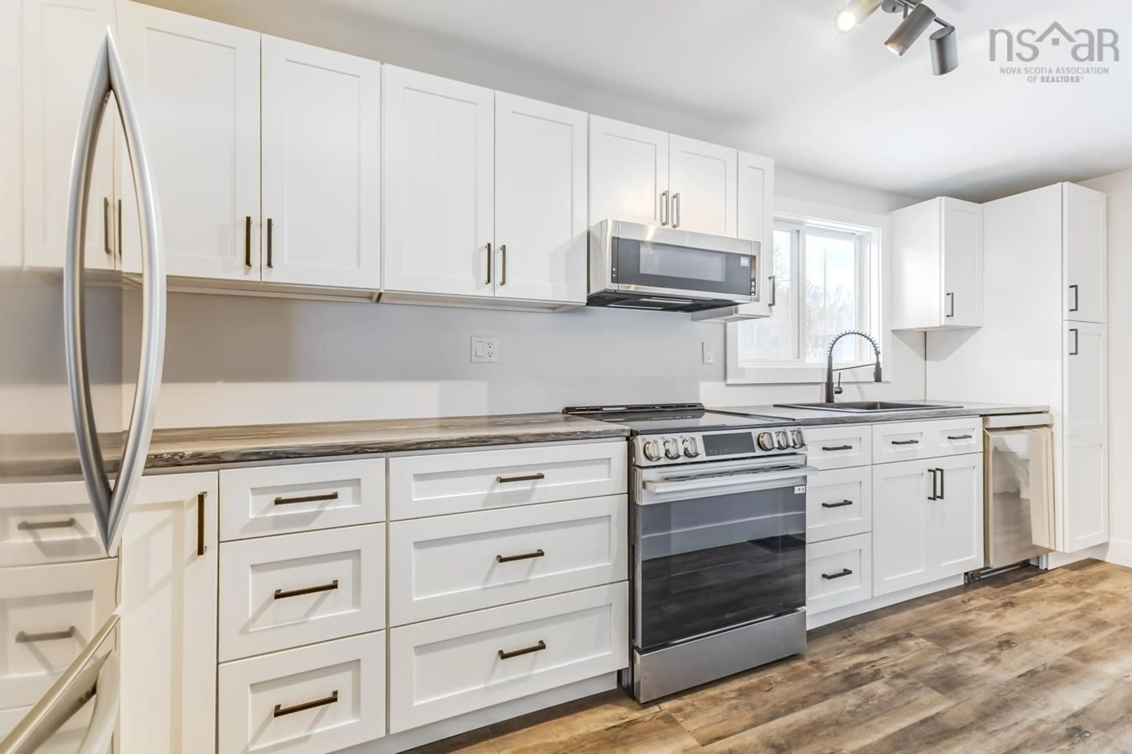 Open concept kitchen, wood/laminate floor for 2466 Kemptown Rd, Upper Kemptown Nova Scotia B0K 1V0
