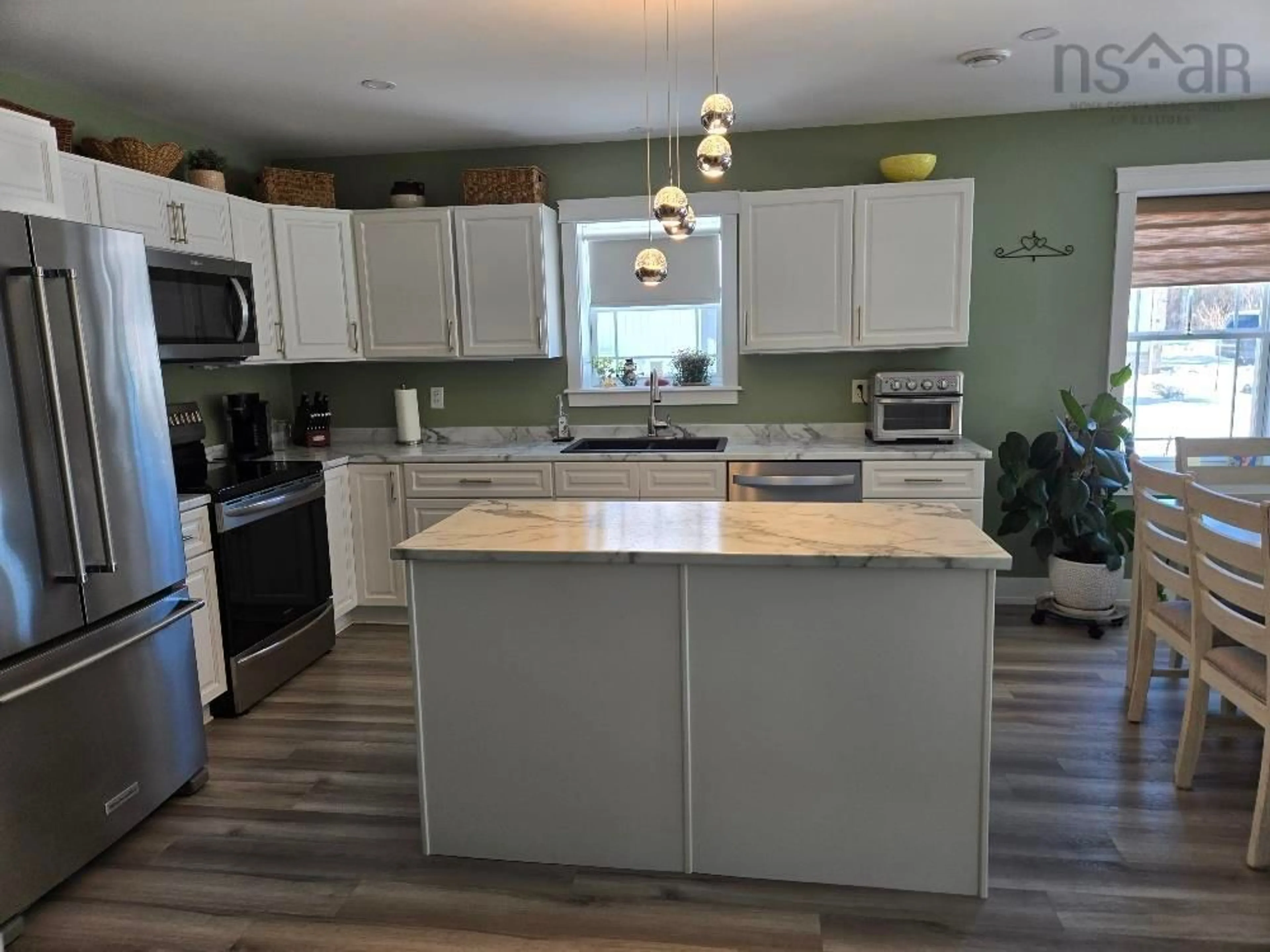 Open concept kitchen, unknown for 17 Riverview Dr, Murray Siding Nova Scotia B6L 4B6