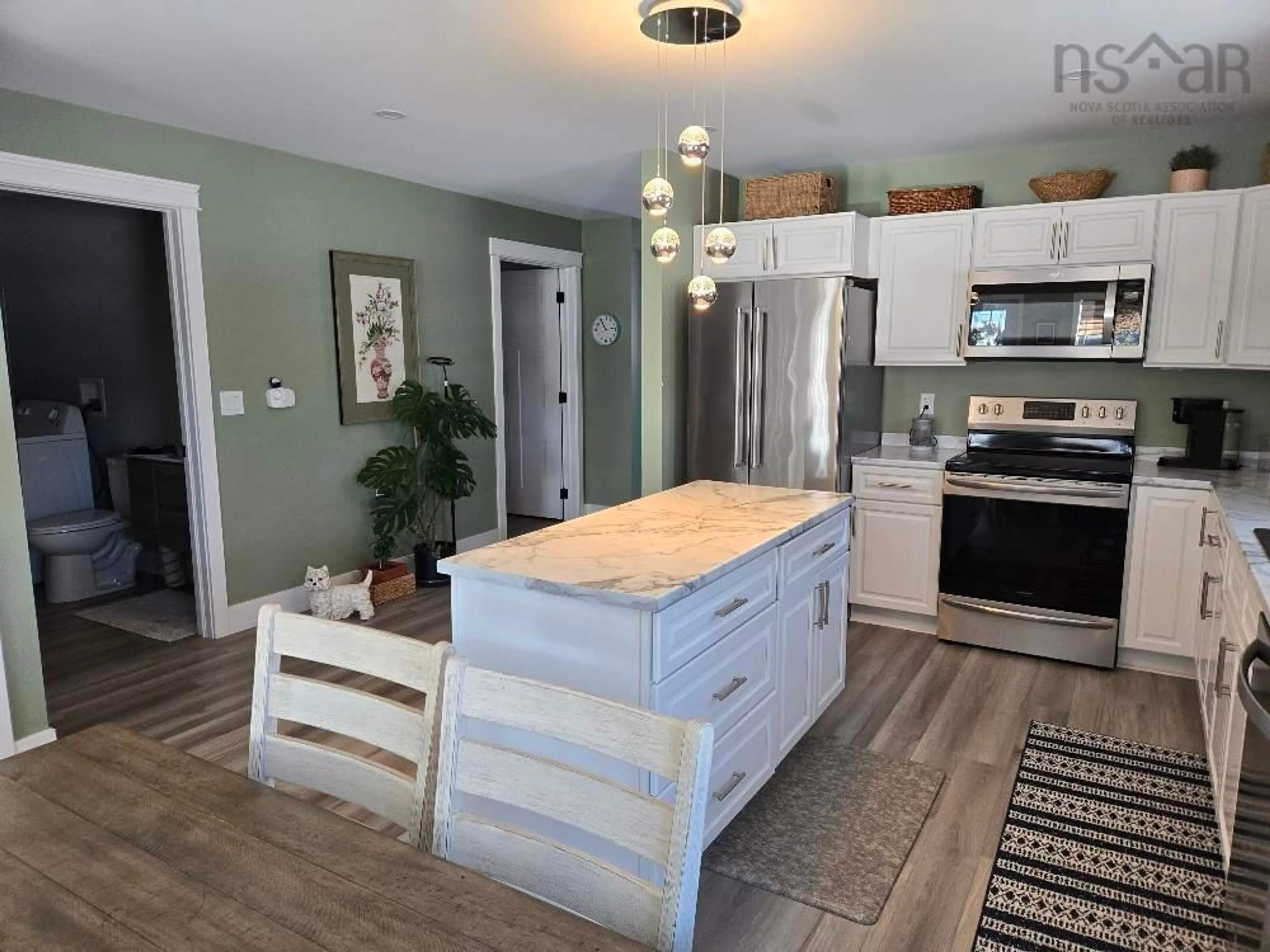 Open concept kitchen, unknown for 17 Riverview Dr, Murray Siding Nova Scotia B6L 4B6