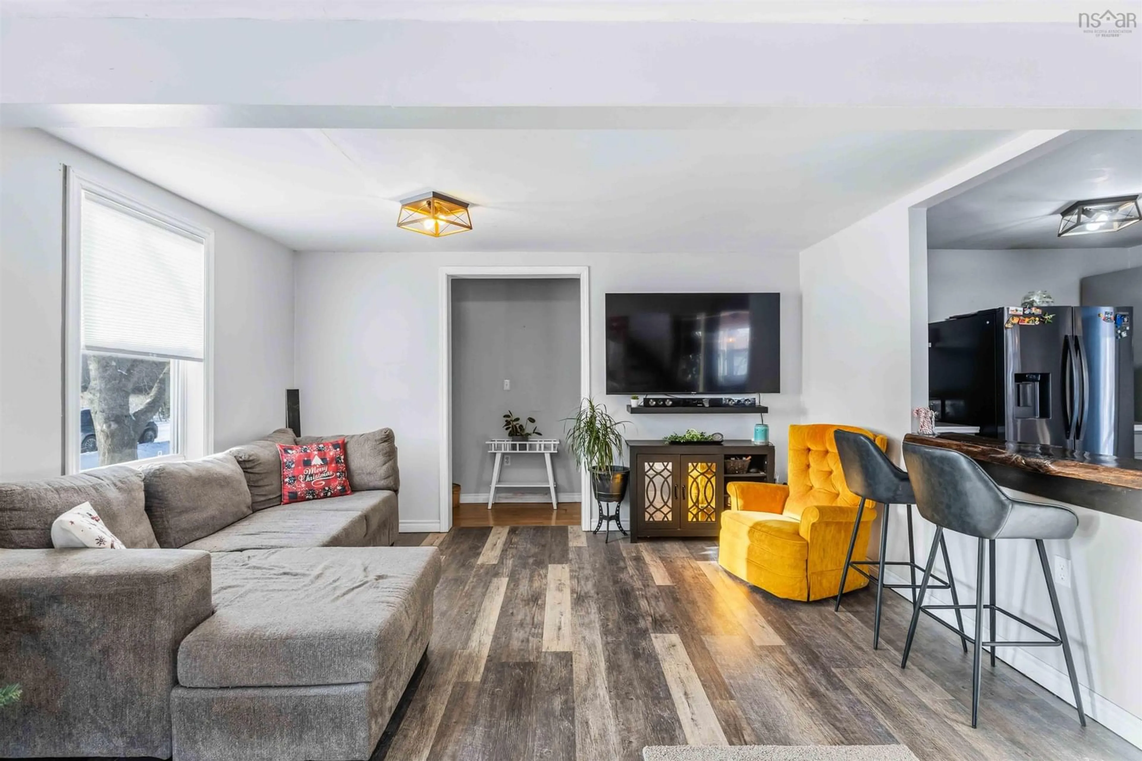 Living room with furniture, wood/laminate floor for 417 Dorey Rd, Aylesford Nova Scotia B0P 1C0