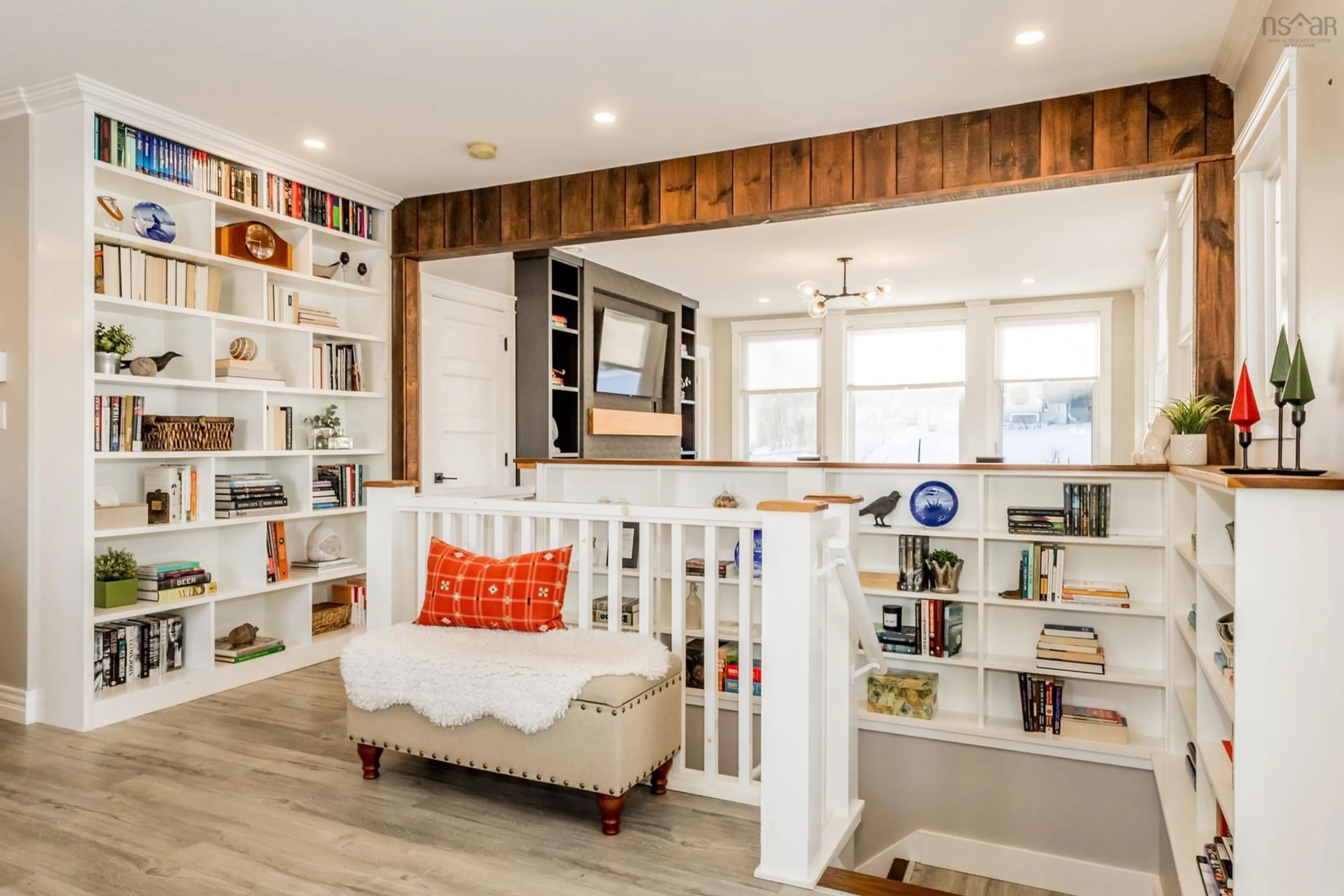 Living room with furniture, wood/laminate floor for 15 Hillcrest Ave, Wolfville Nova Scotia B4P 1T5