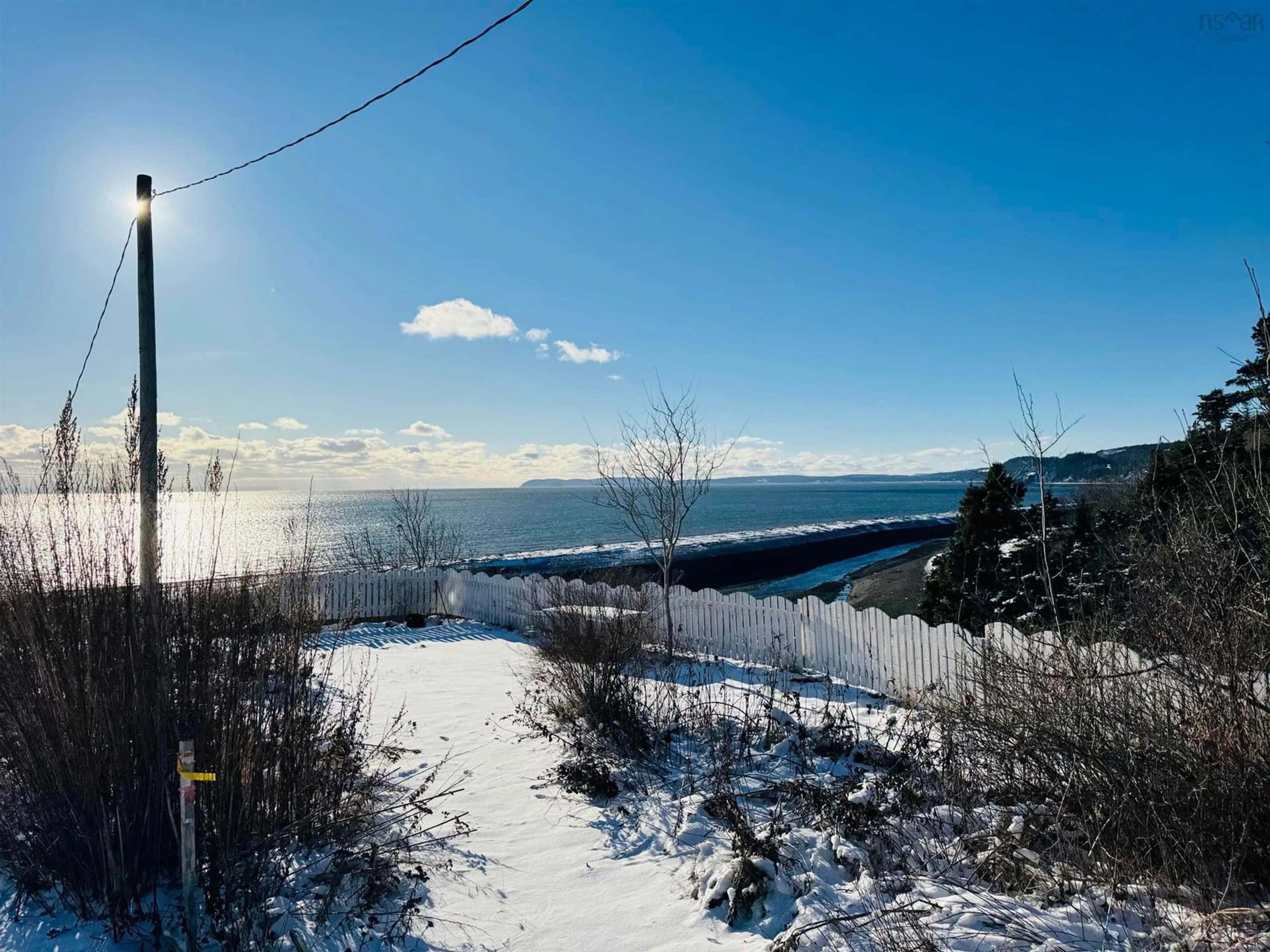 A pic from outside/outdoor area/front of a property/back of a property/a pic from drone, water/lake/river/ocean view for 53 Merriam Rd, Port Greville Nova Scotia B0M 1S0
