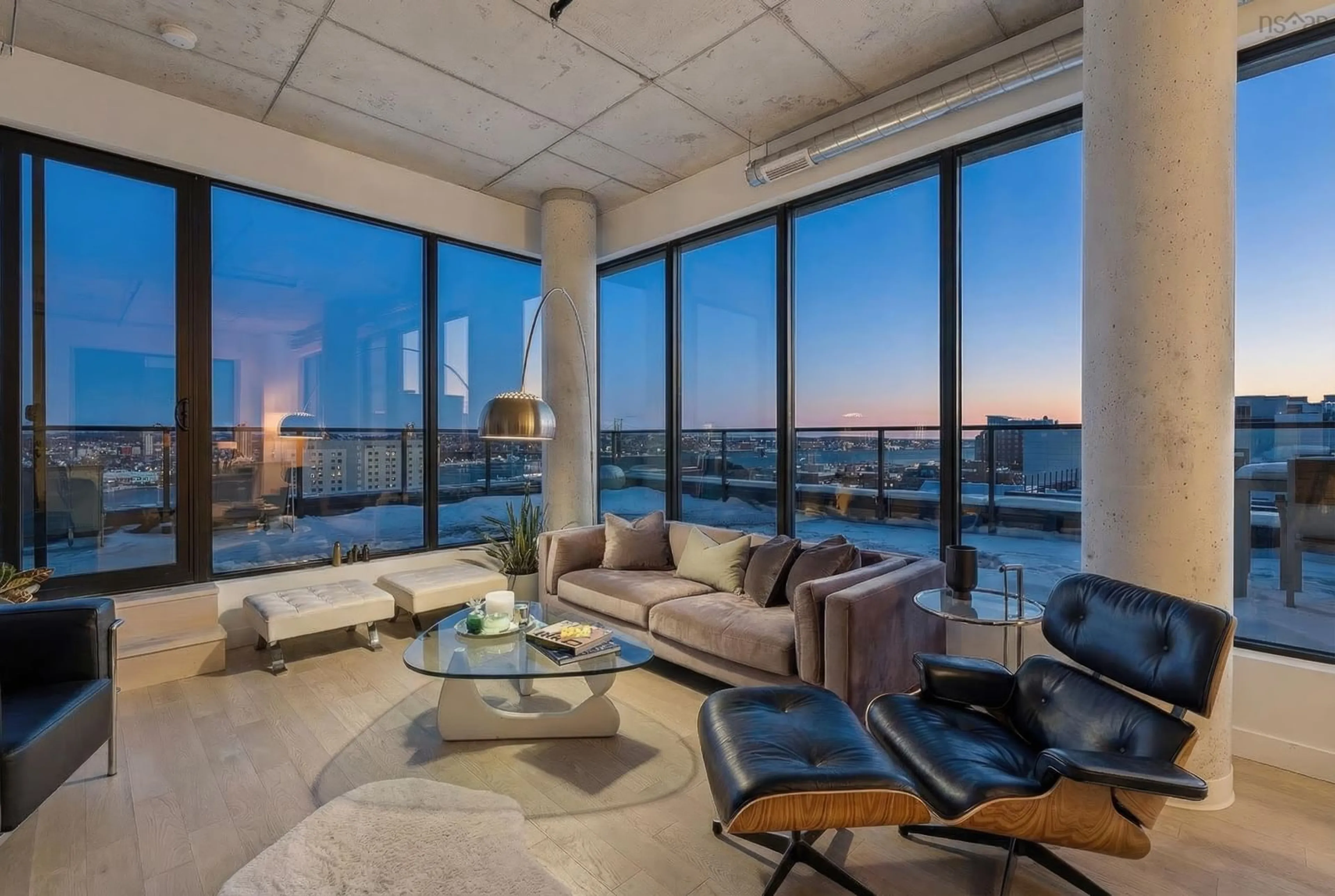 Living room with furniture, cement floor for 5511 Bilby St #PH1, Halifax Peninsula Nova Scotia B3K 1V4