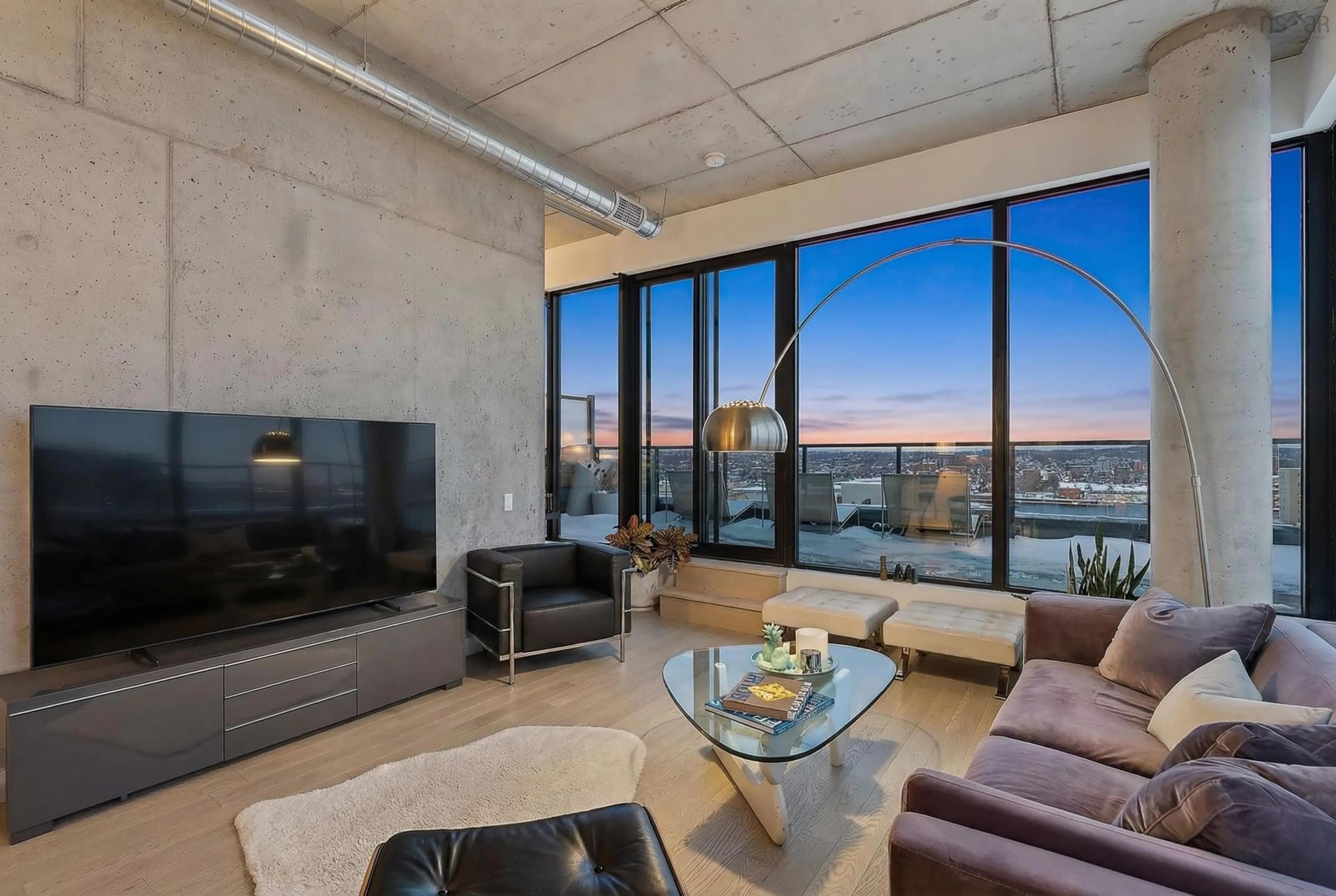 Living room with furniture, cement floor for 5511 Bilby St #PH1, Halifax Peninsula Nova Scotia B3K 1V4