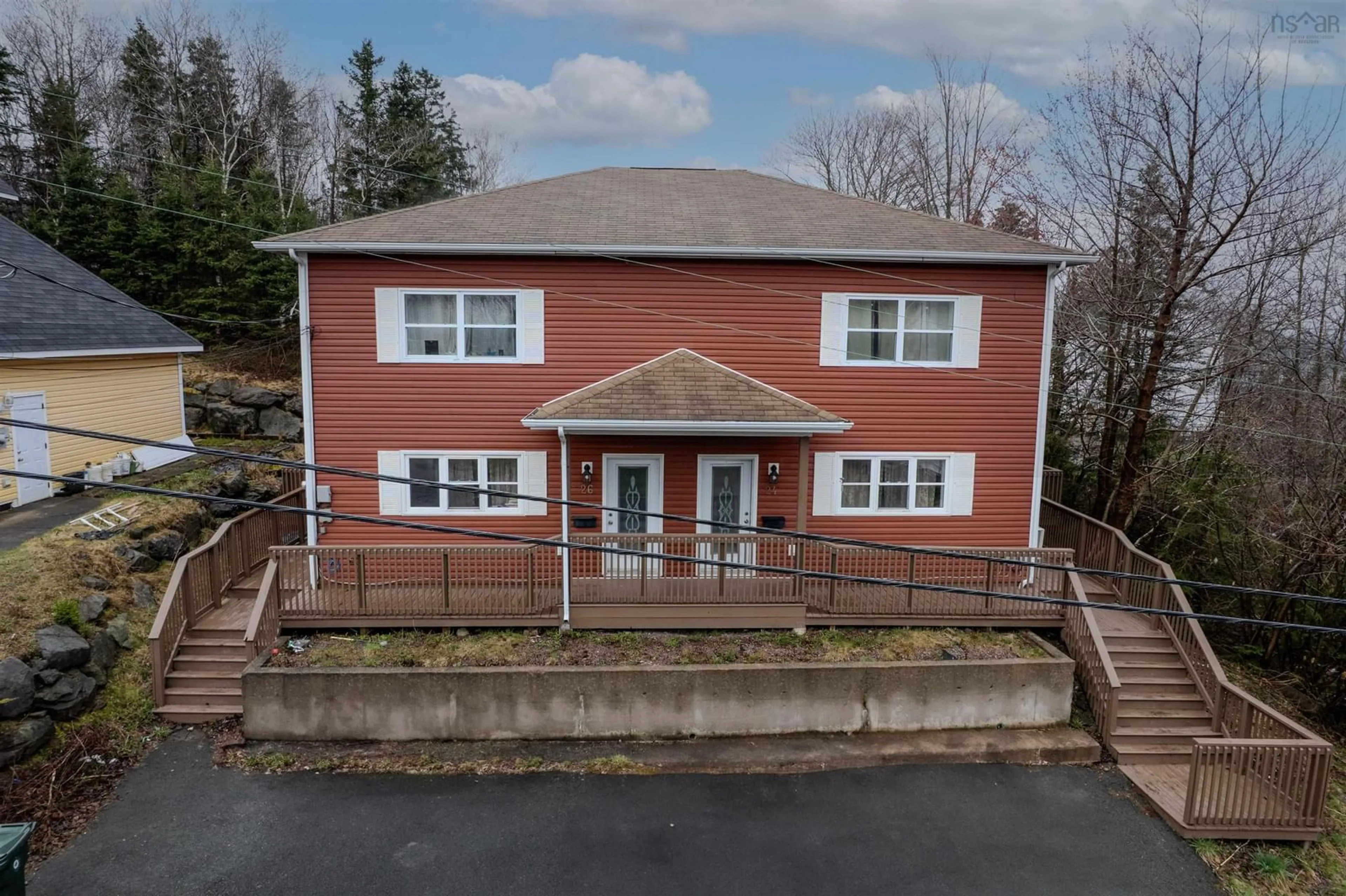 A pic from outside/outdoor area/front of a property/back of a property/a pic from drone, building for 24-26 Weidner Dr, Sydney River Nova Scotia B1S 1V5